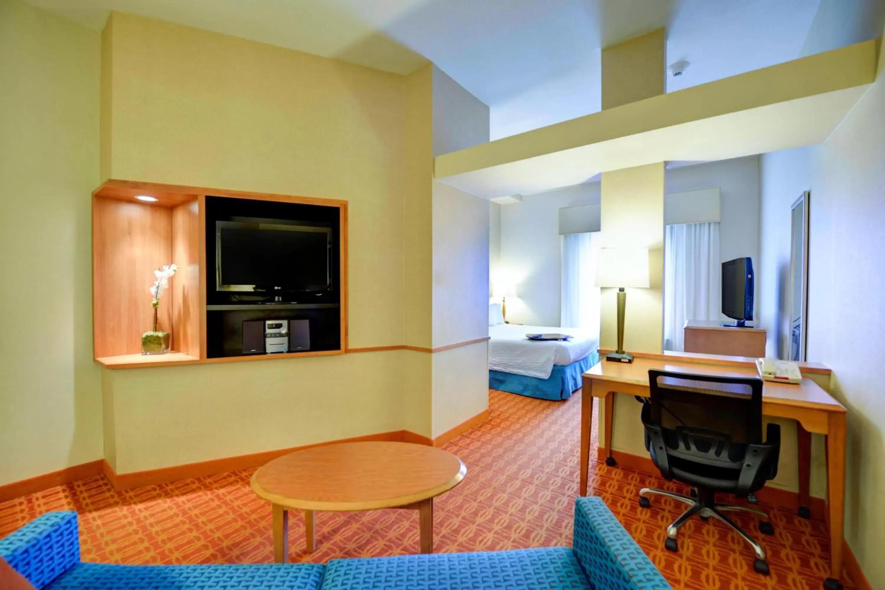 Photo of the whole room, TV/Entertainment Center in Fairfield Inn & Suites Warner Robins