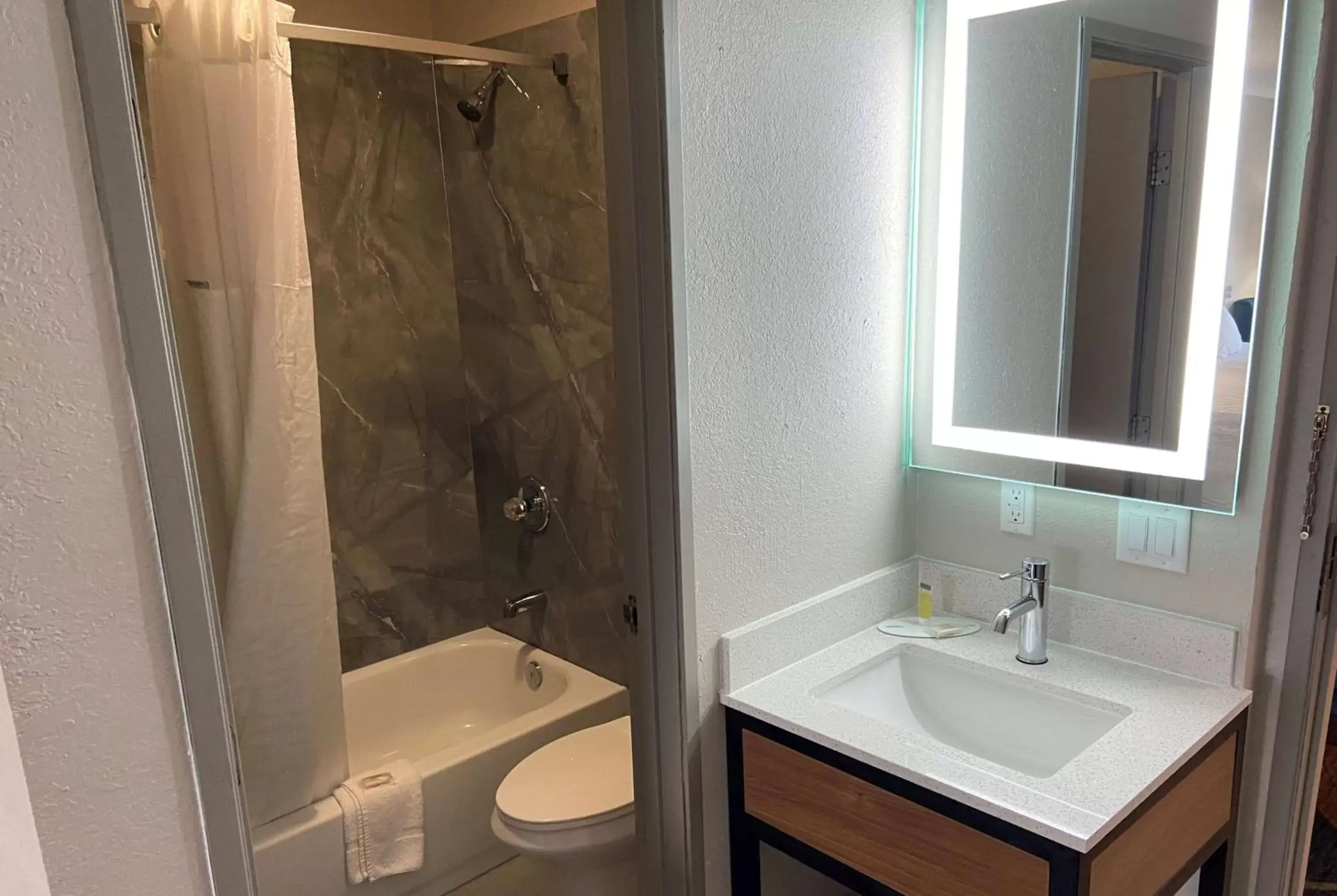 TV and multimedia, Bathroom in Days Inn by Wyndham Ankeny - Des Moines