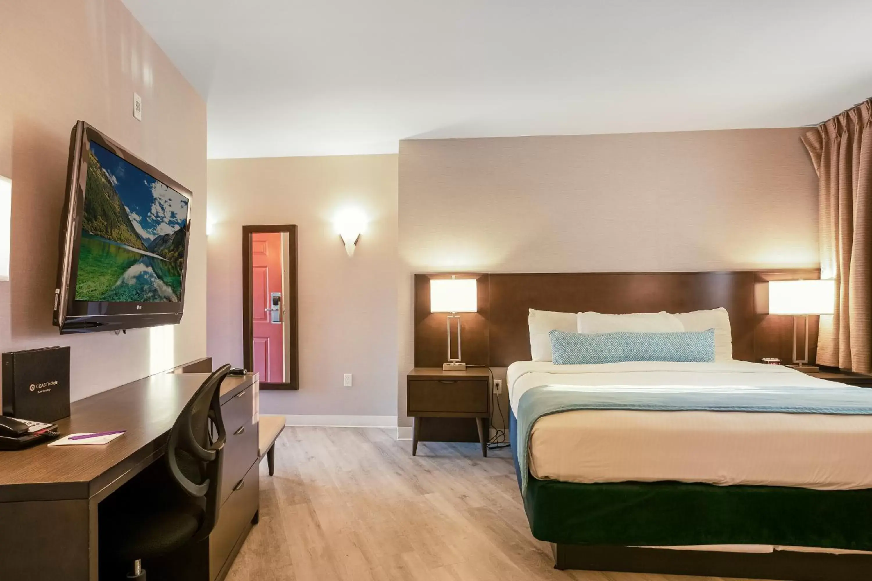 Bed in Safari Inn, a Coast Hotel
