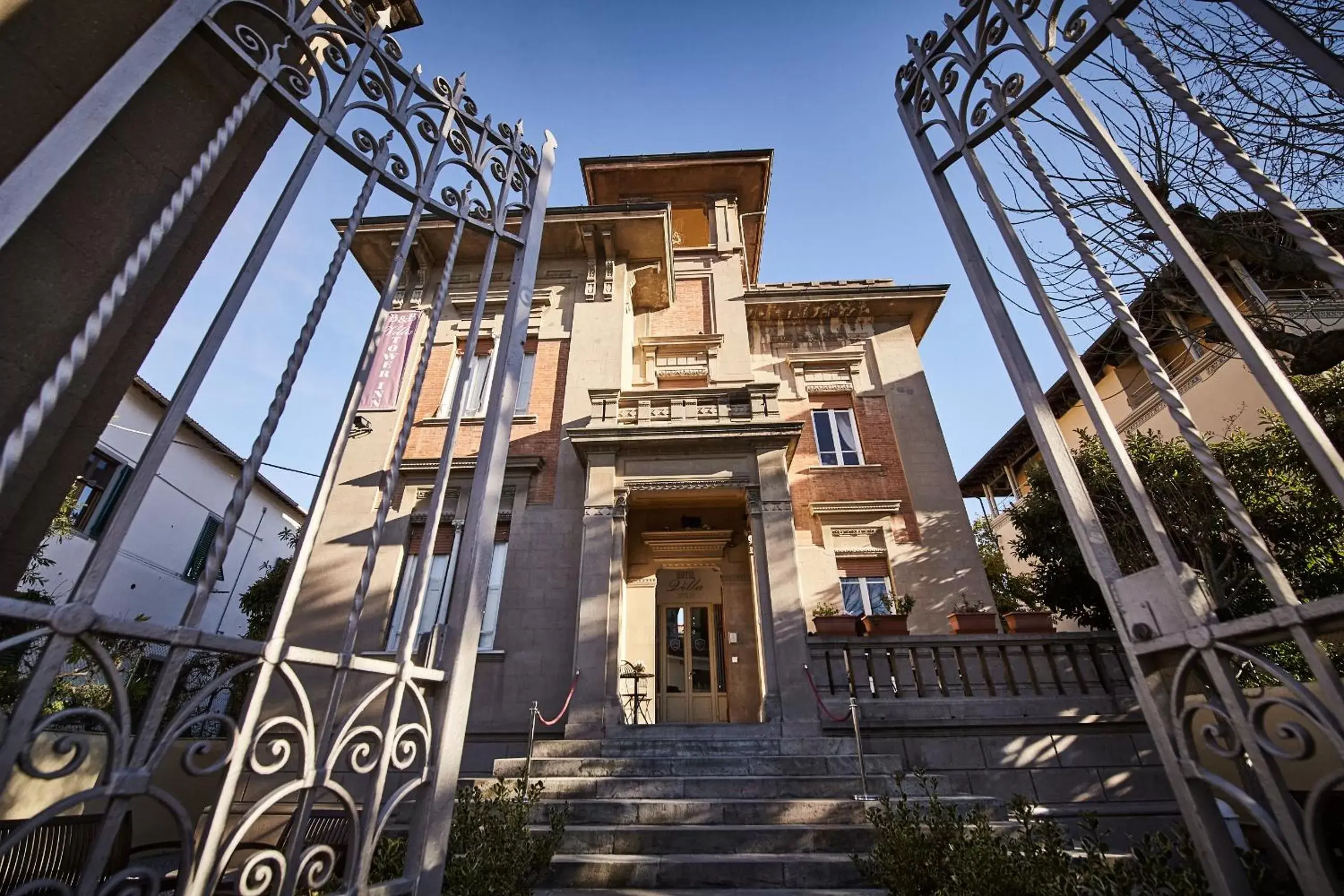 Facade/entrance, Property Building in Villa Tower Inn