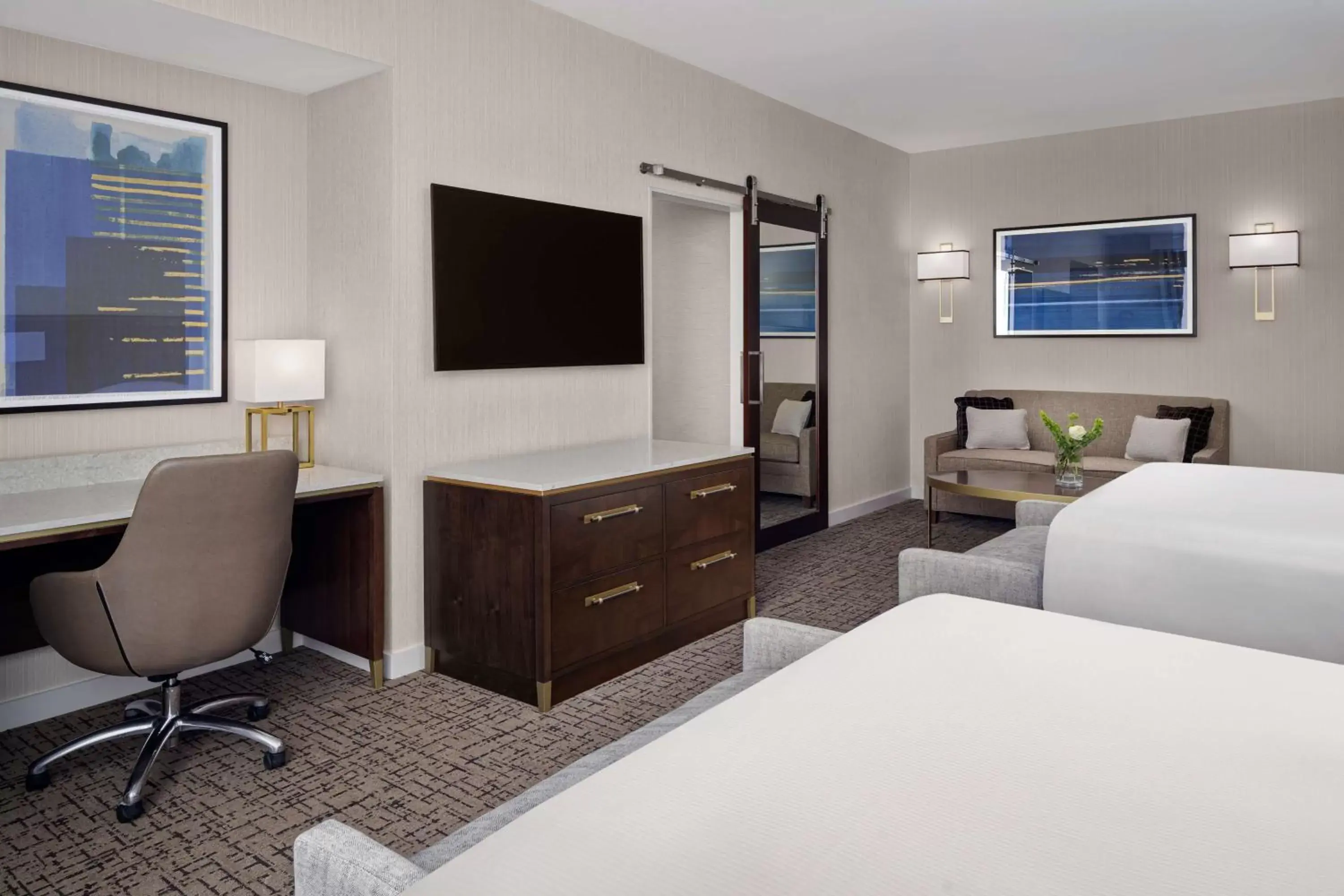 Bed, TV/Entertainment Center in Hilton Indianapolis Hotel & Suites
