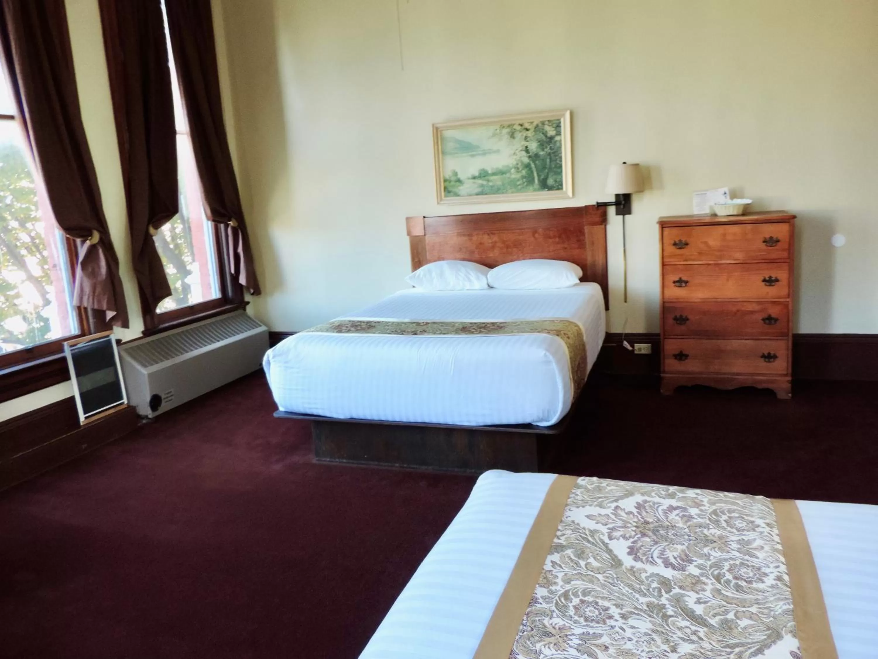 Bed in The Monarch Hotel