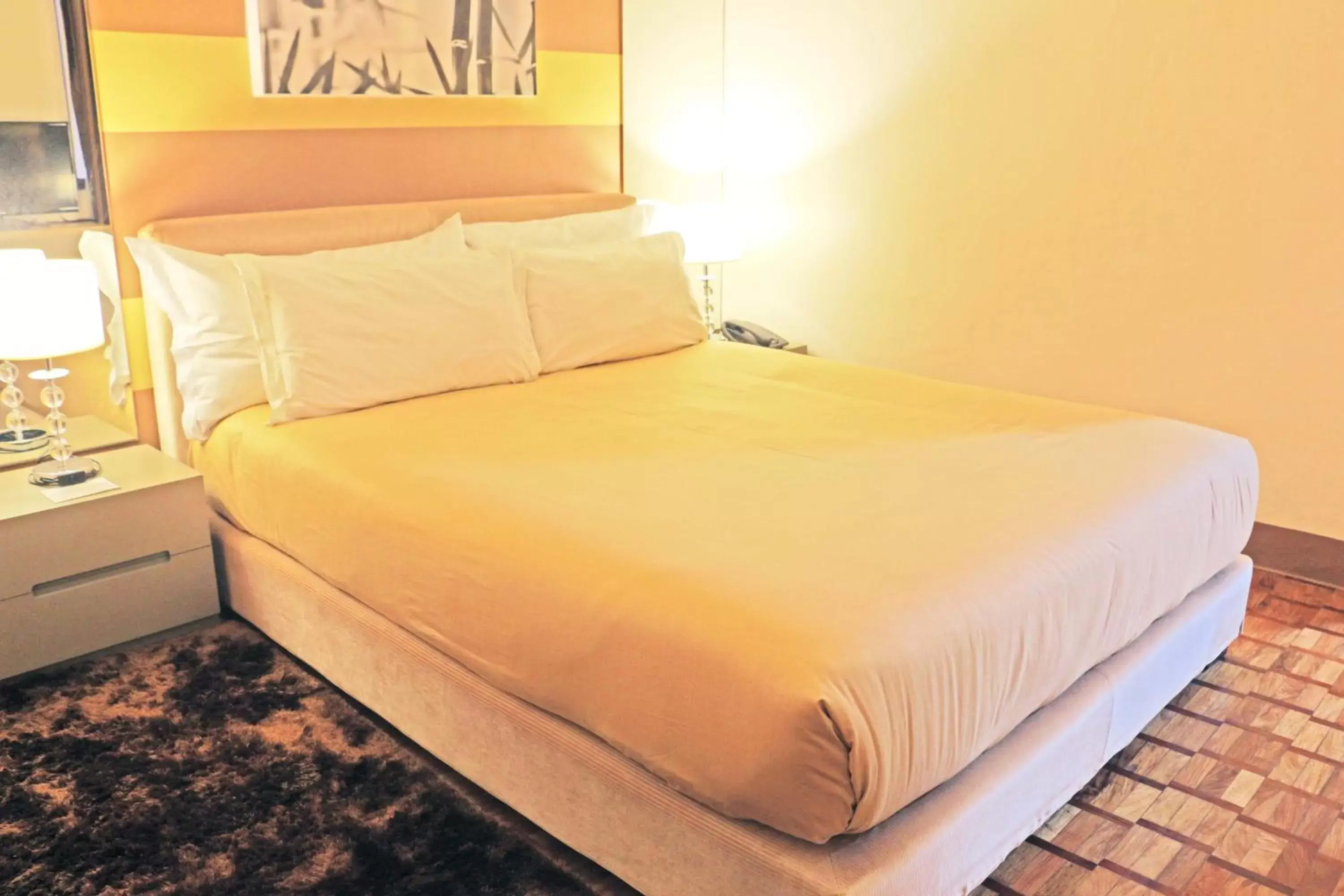 Bed in Prince Plaza II Condotel