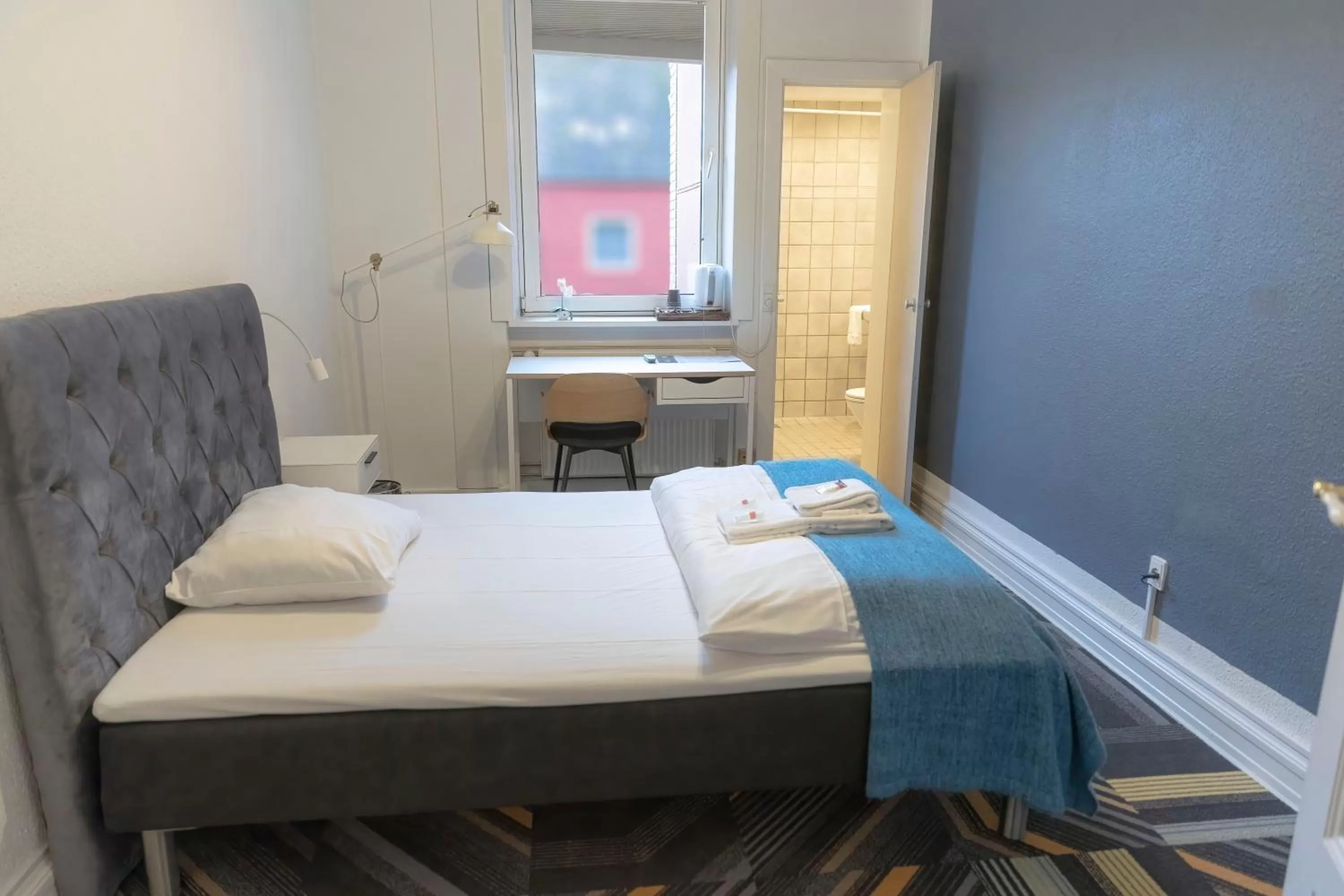 Bed in Hotel Harmonien