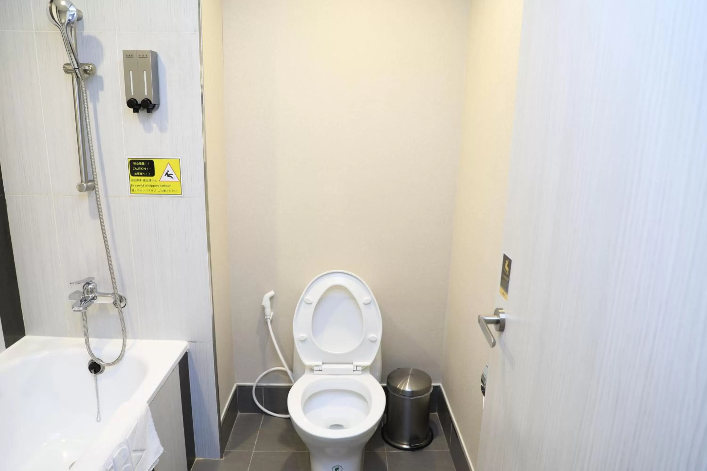 Toilet in Wholesome Hotel