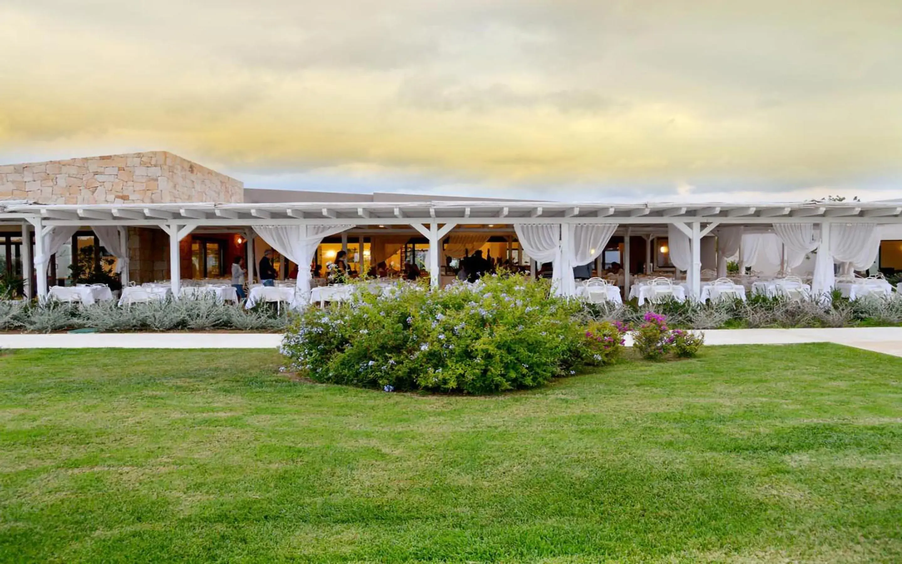 Restaurant/places to eat, Property Building in Baglioni Resort Sardinia - The Leading Hotels of the World