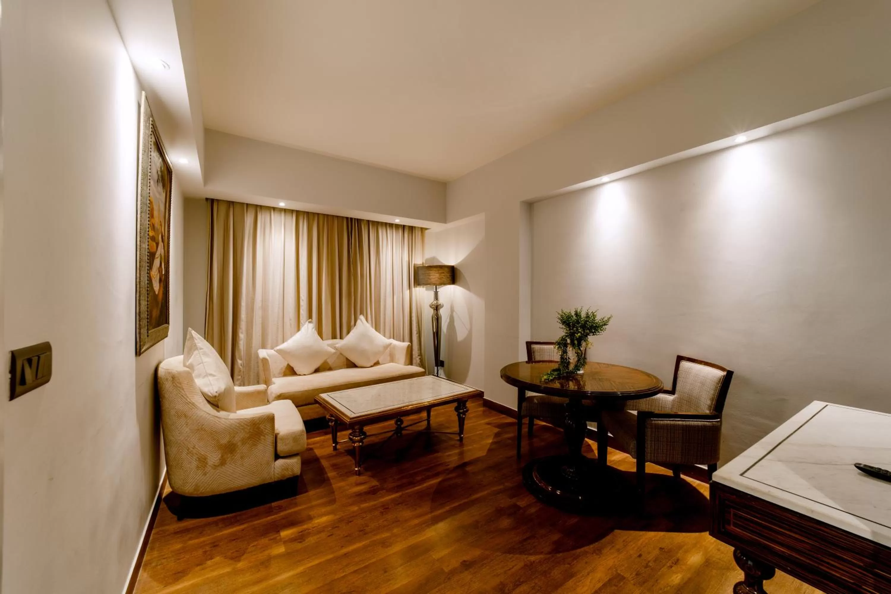 Living room, Bed in Sarovar Portico Jaipur