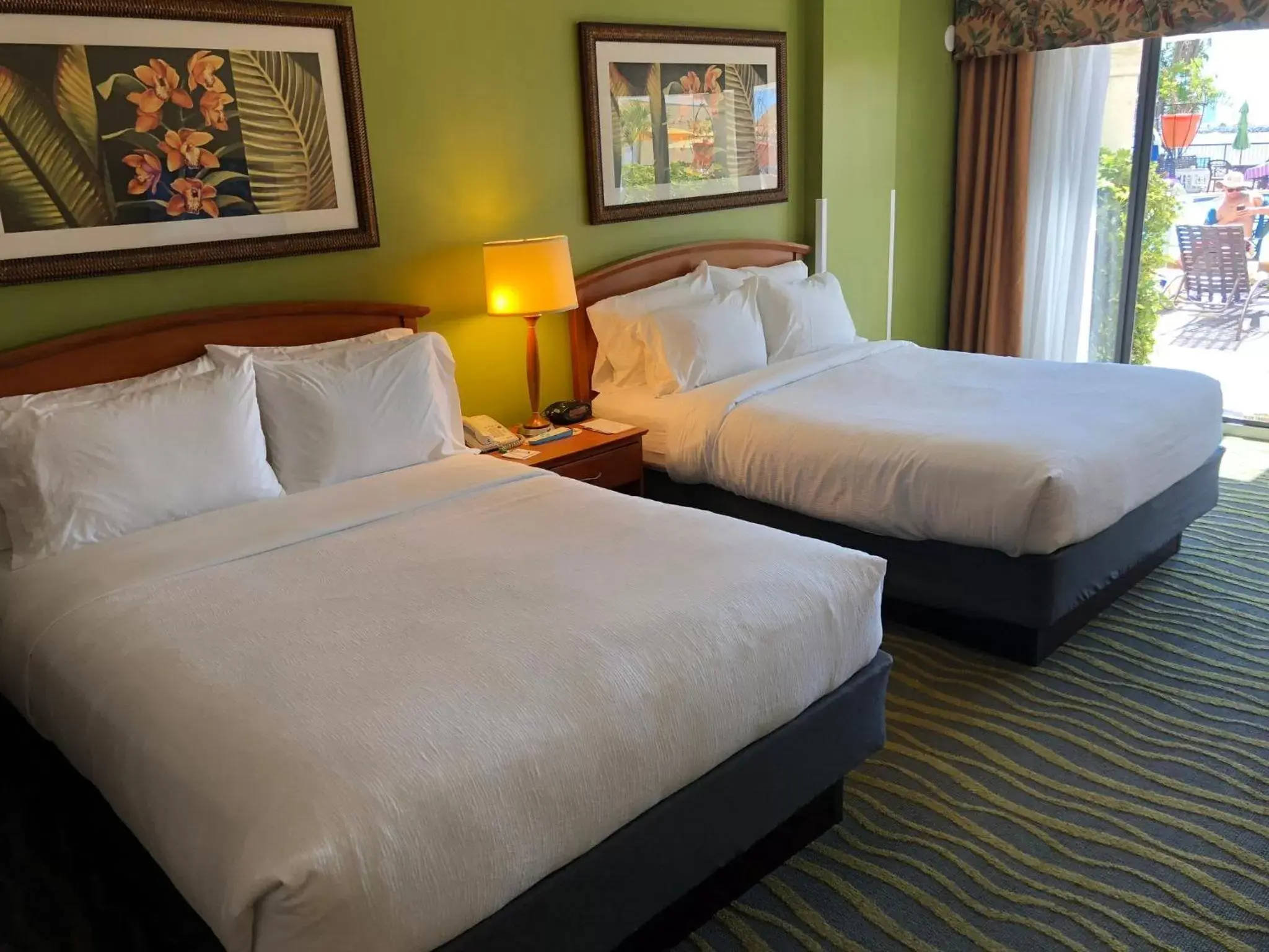 Standard Queen Room with Patio and Pool Access in Holiday Inn & Suites Clearwater Beach, an IHG Hotel