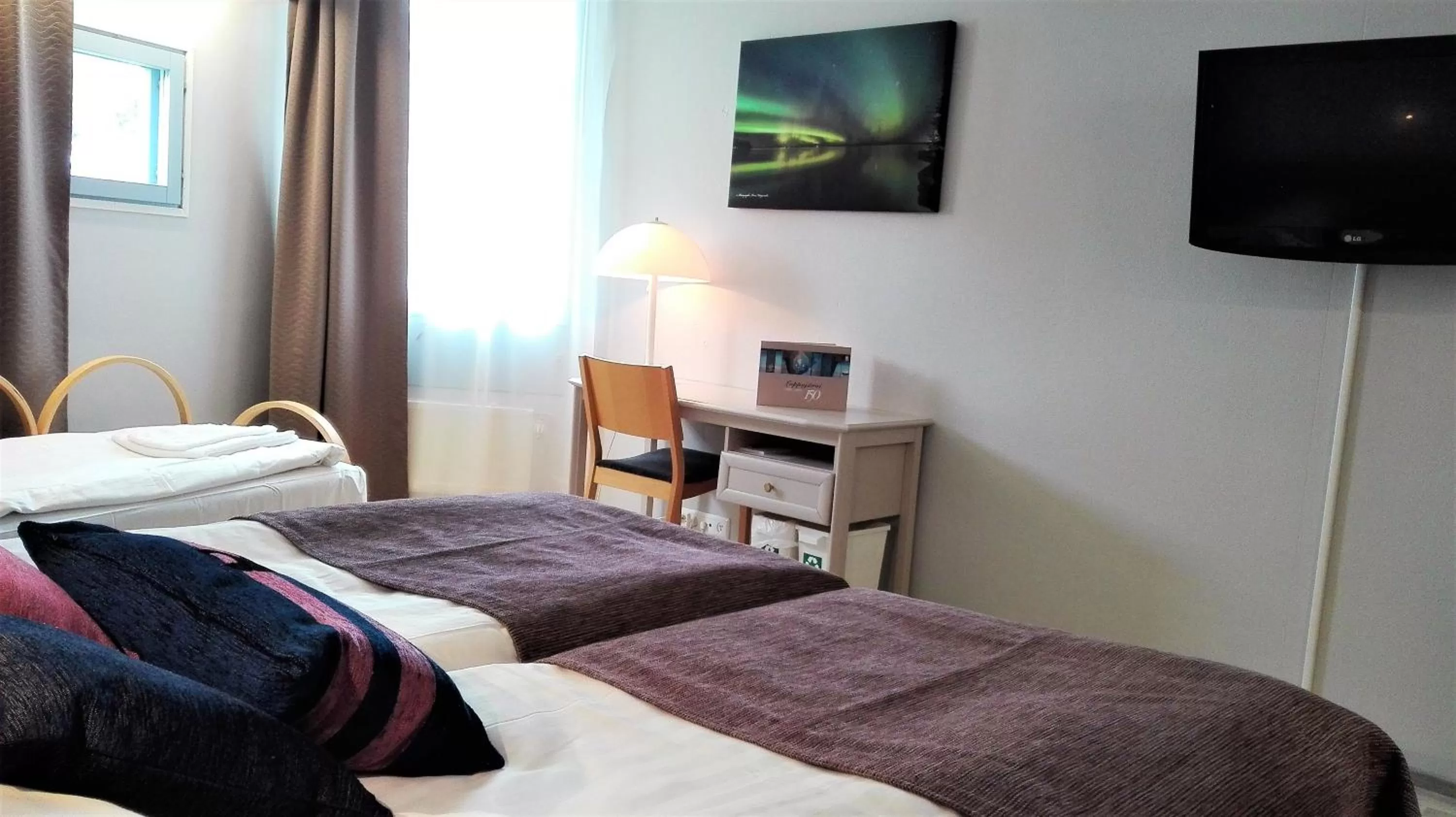 TV/Entertainment Center in Hotelli Kivitippu
