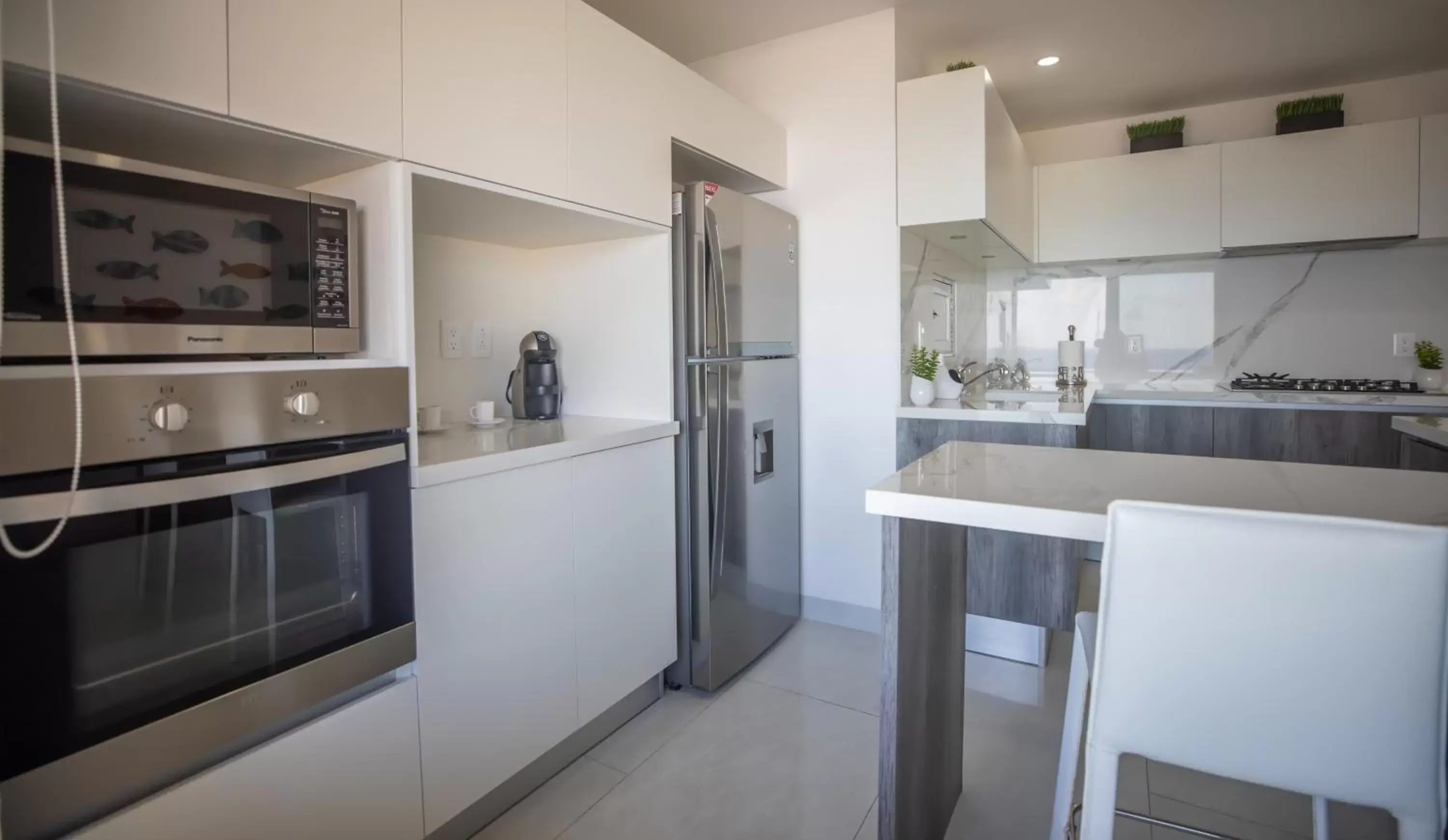 kitchen, Kitchen/Kitchenette in Beachfront Penthouses by LivIN Cancun