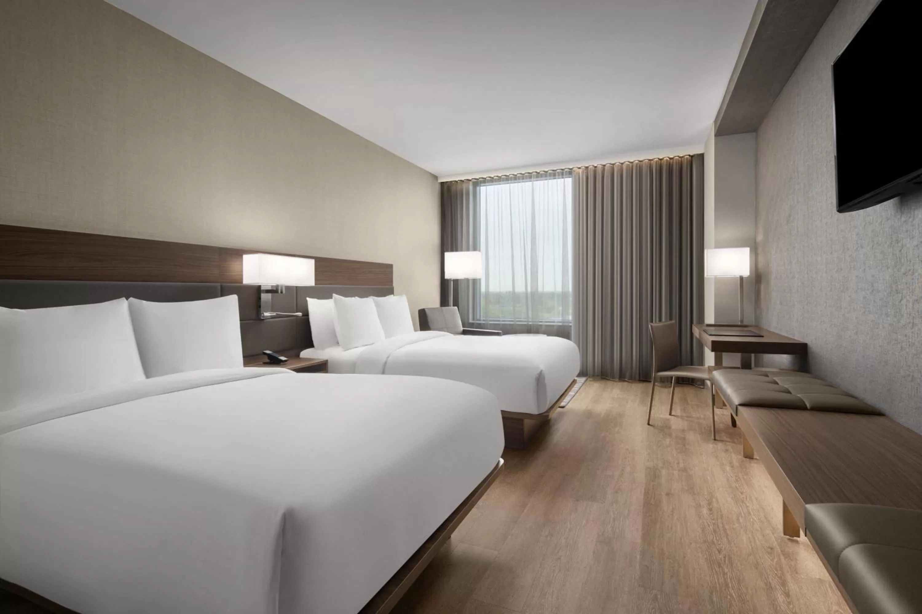 Photo of the whole room, Bed in AC Hotel by Marriott Fort Lauderdale Sawgrass Mills Sunrise