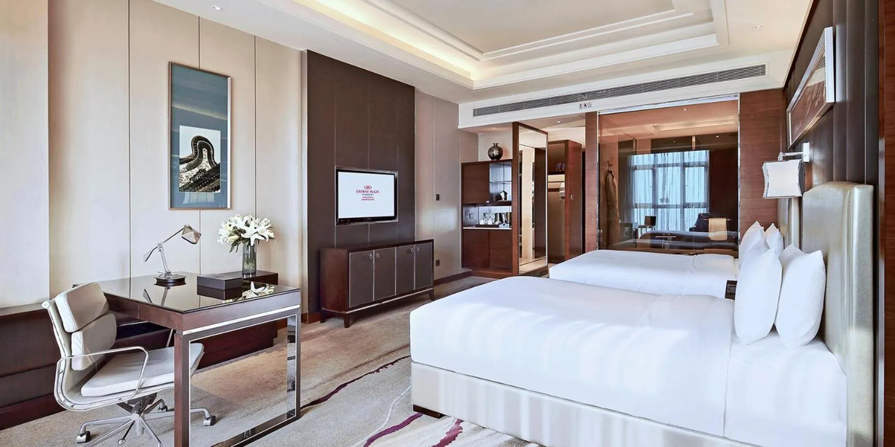 Photo of the whole room, Bed in Crowne Plaza Tianjin Jinnan by IHG