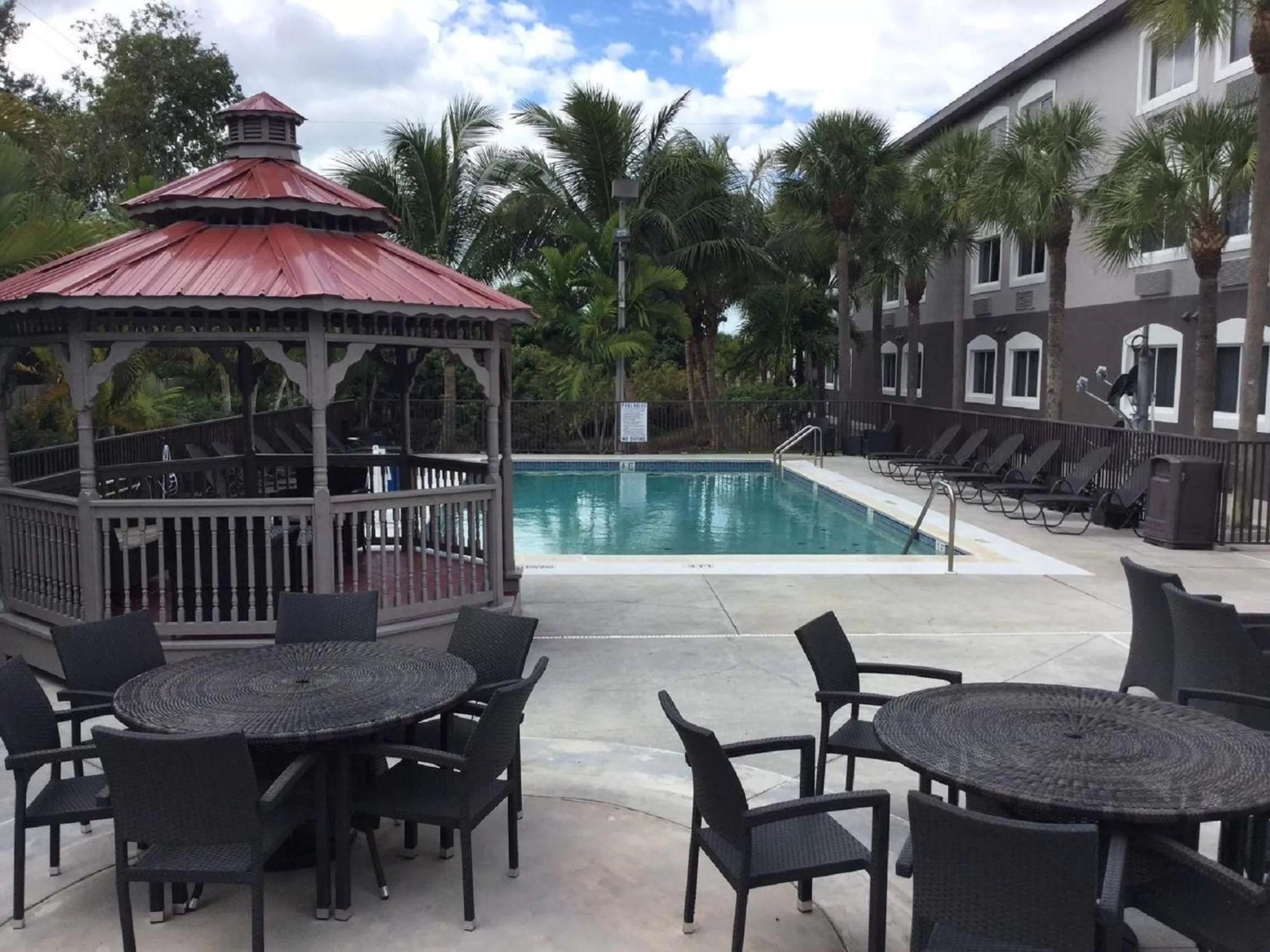 Pool view in Days Inn & Suites by Wyndham Bonita Springs North Naples