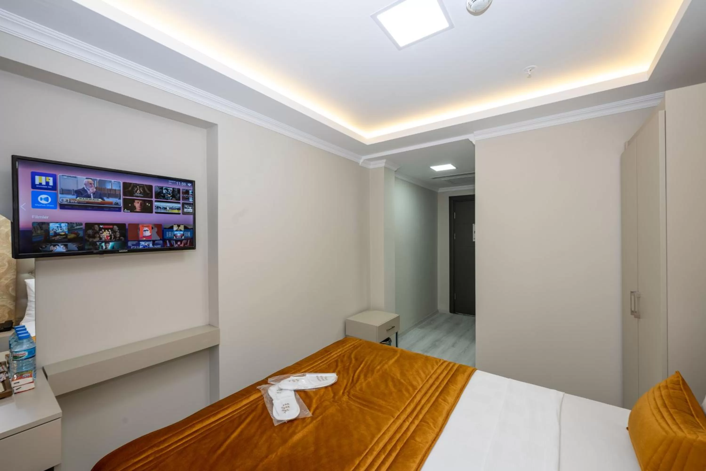 Bed in SKYSTAR DELUXE HOTEL