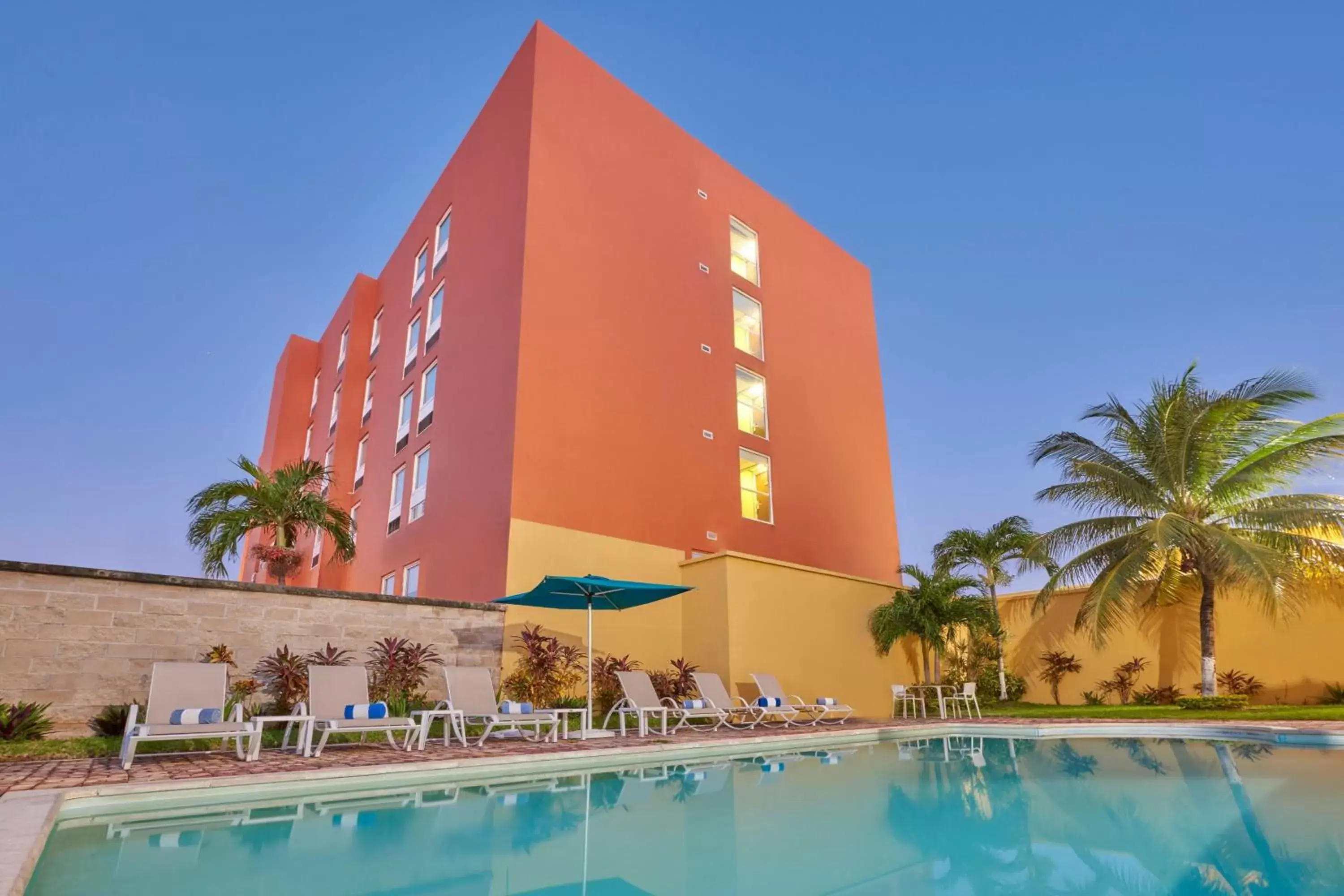 Swimming pool, Property Building in City Express Junior by Marriott Cancun