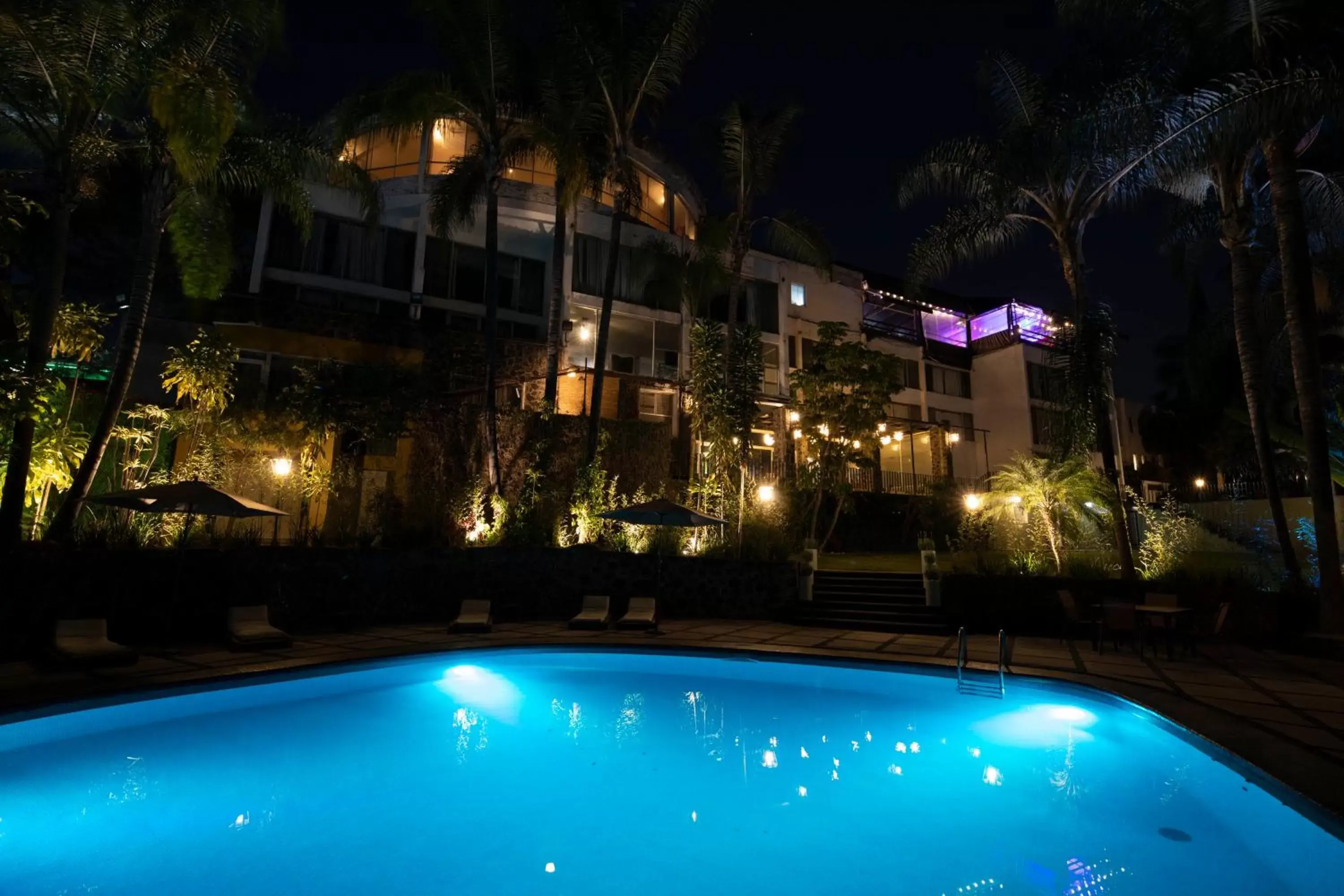 Pool view, Property Building in Hotel Grand Vista Cuernavaca