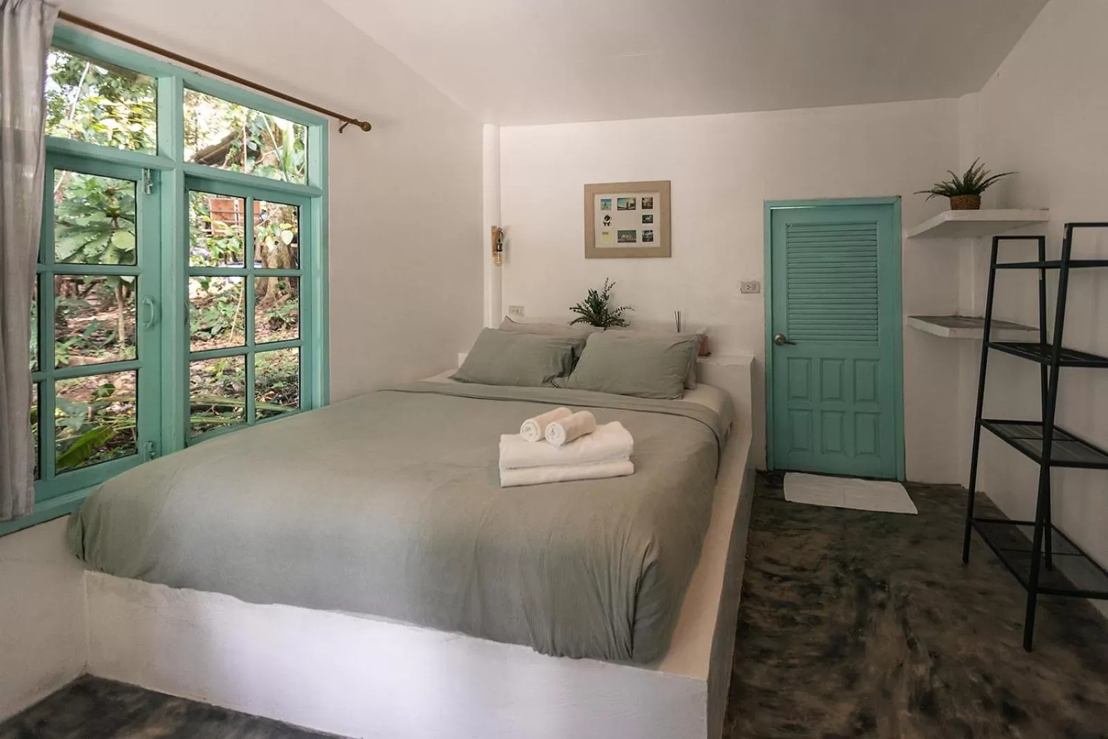 Bed in Indie Beach Bungalows