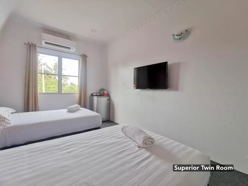 Bed in THE ZULEY HERITAGE HOTEL