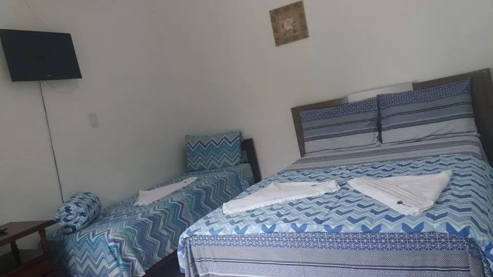 Bedroom, Bed in Pousada Recanto do Teimoso