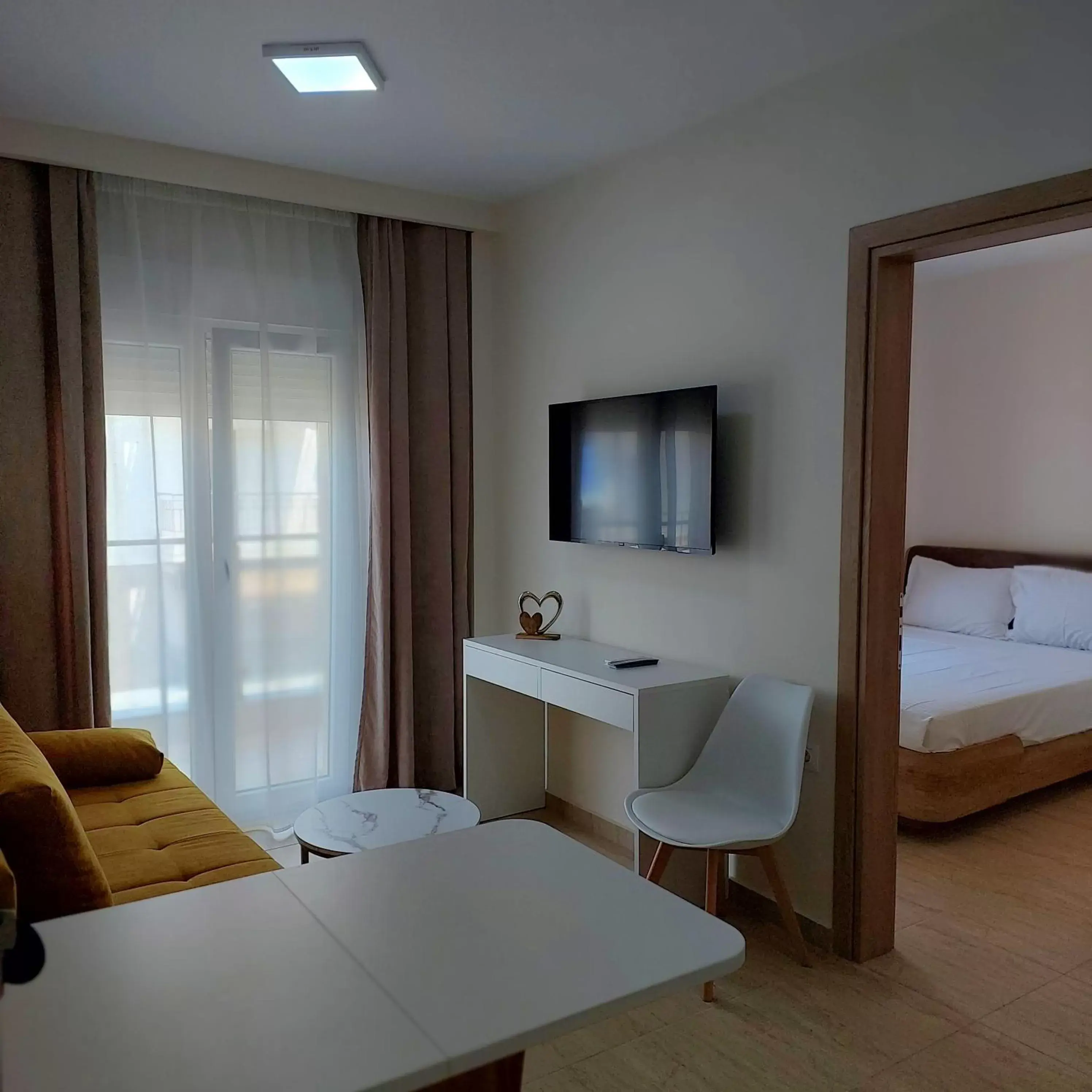 Bed in Navarino Luxe Suites with Sea View