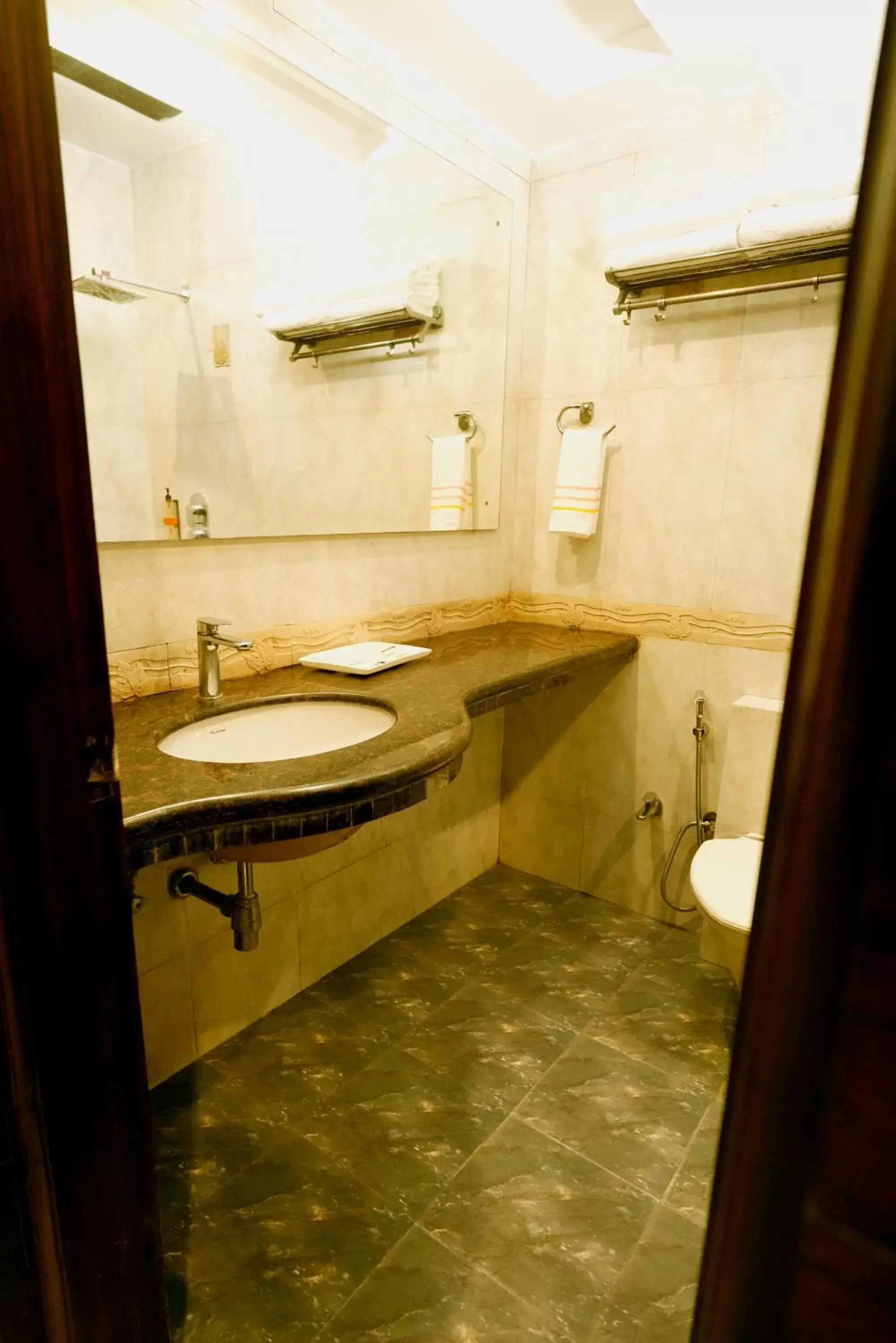 Bathroom in THE SINGH EMPIRE, New Delhi