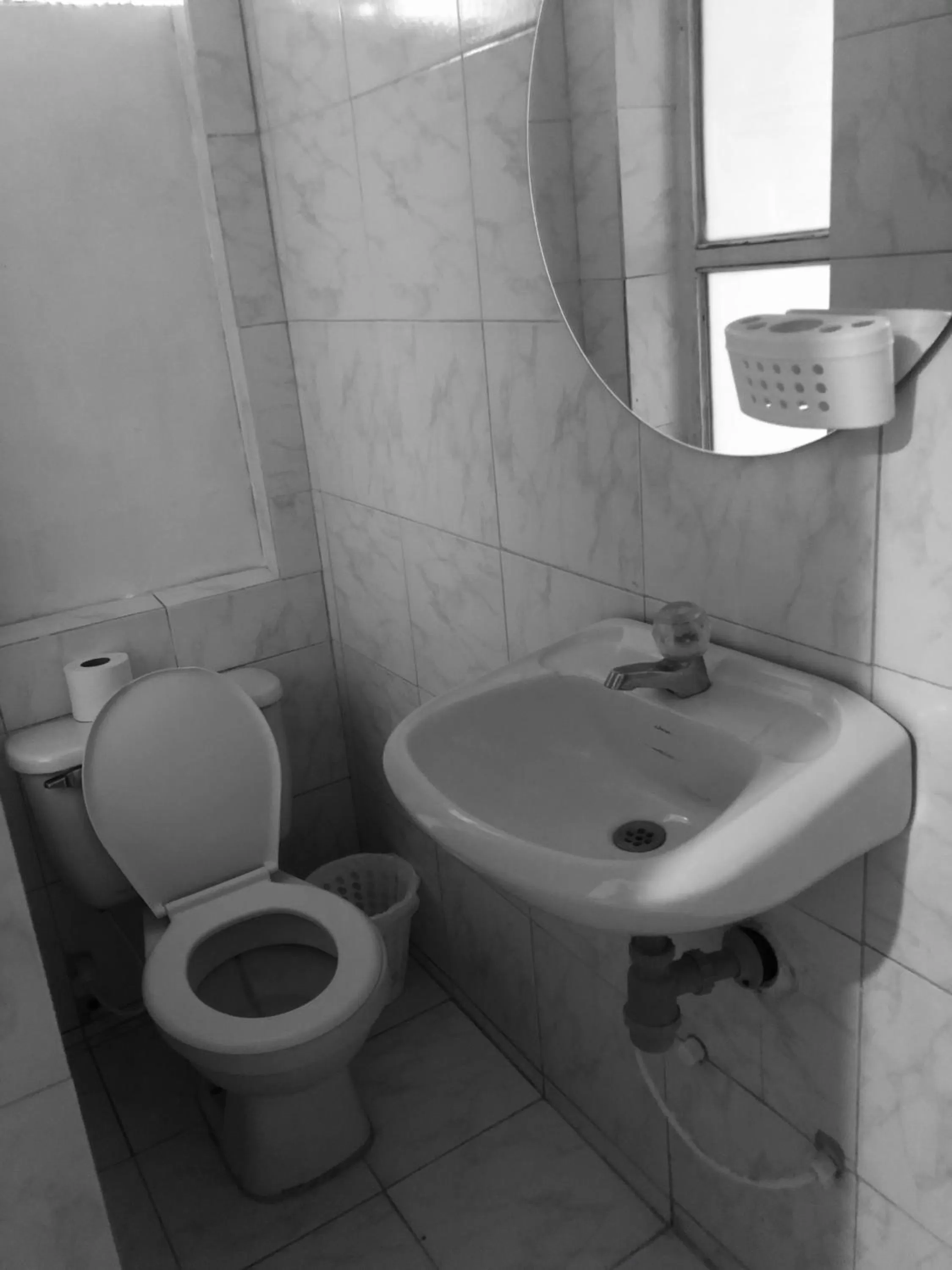 Bathroom in Tita’s Airport Hotel