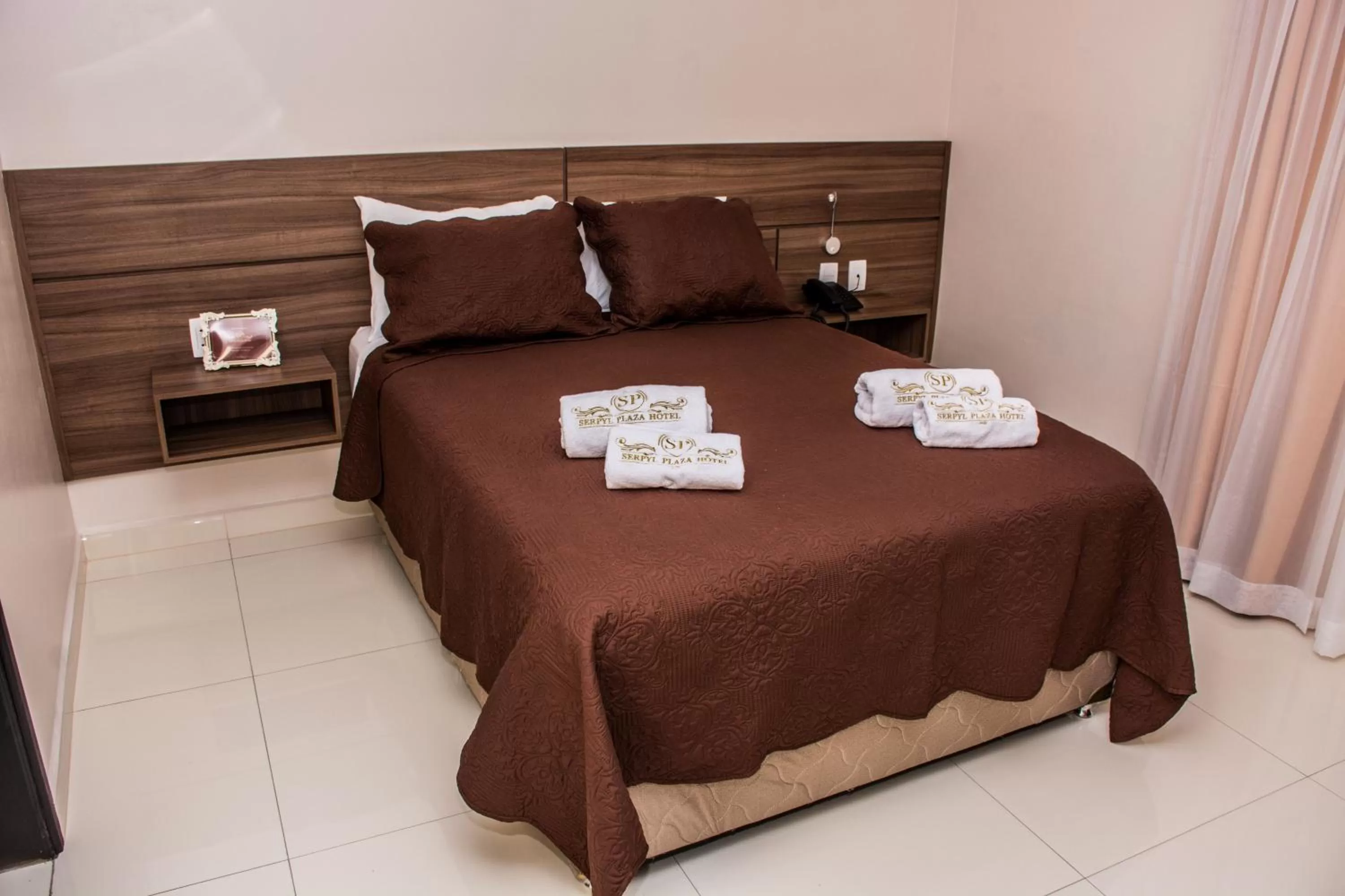 Bed in SERPYL Plaza Hotel