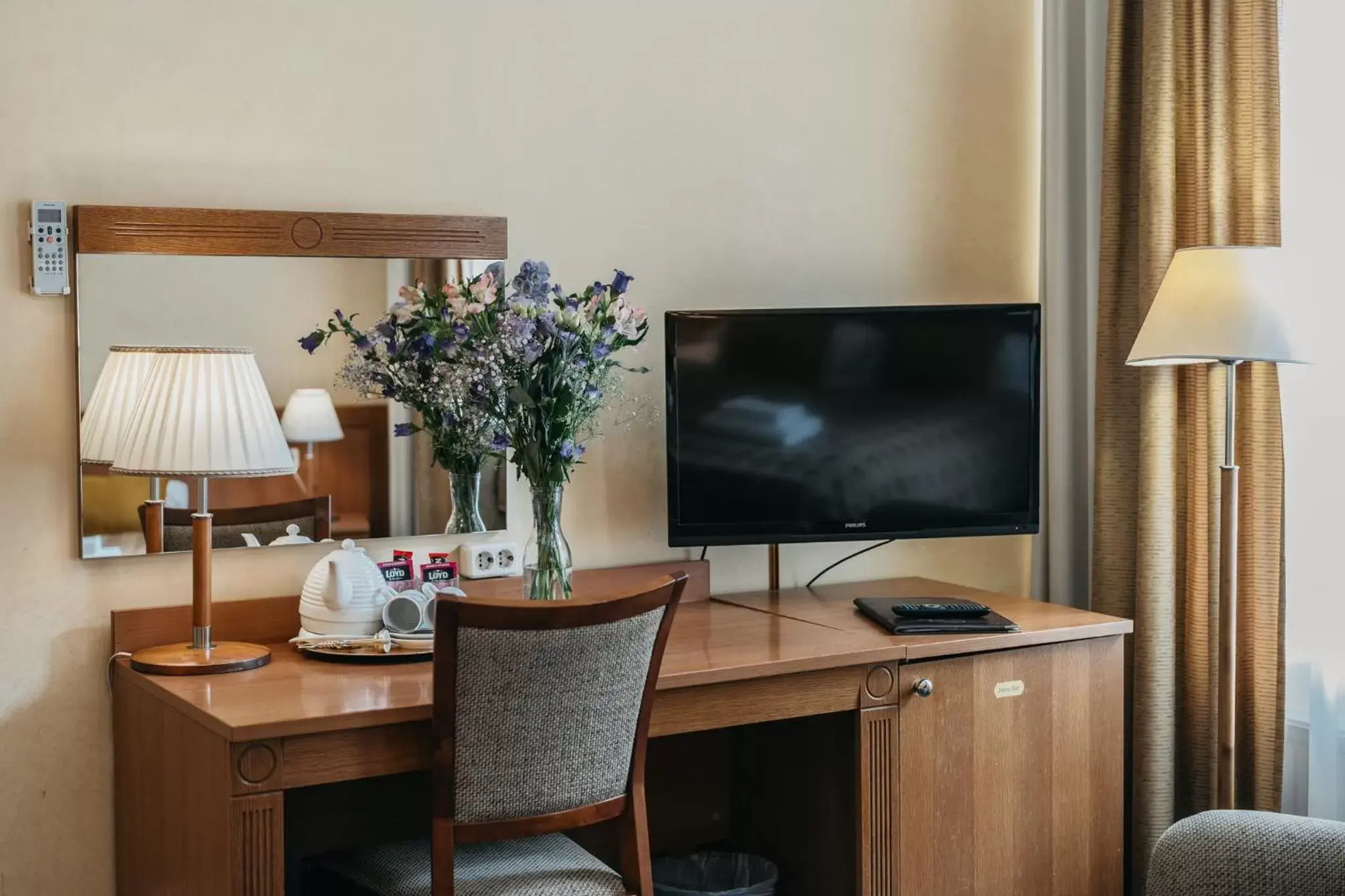 TV and multimedia, TV/Entertainment Center in Hotel Rinno