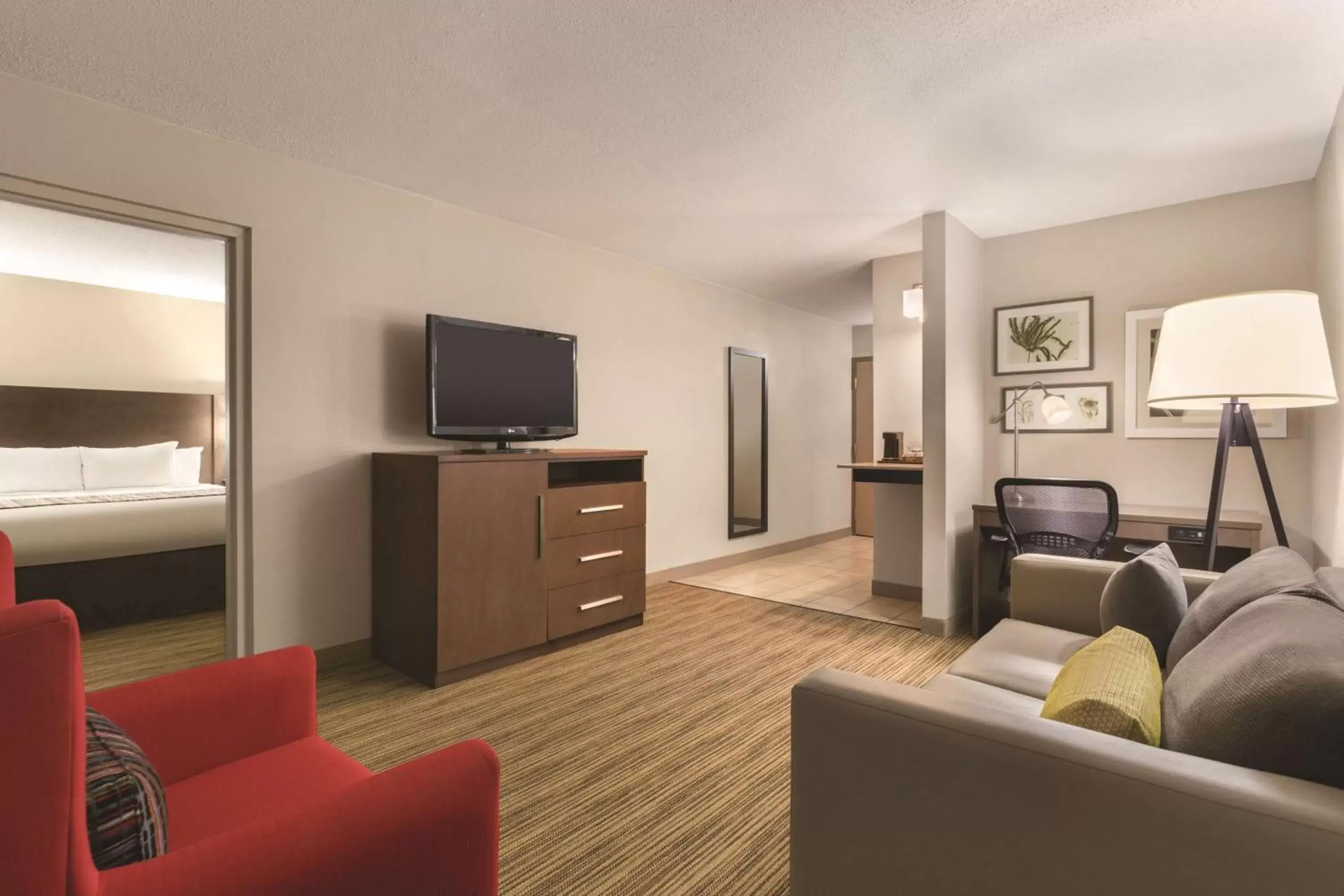 Photo of the whole room, TV/Entertainment Center in Country Inn & Suites by Radisson, Fergus Falls, MN