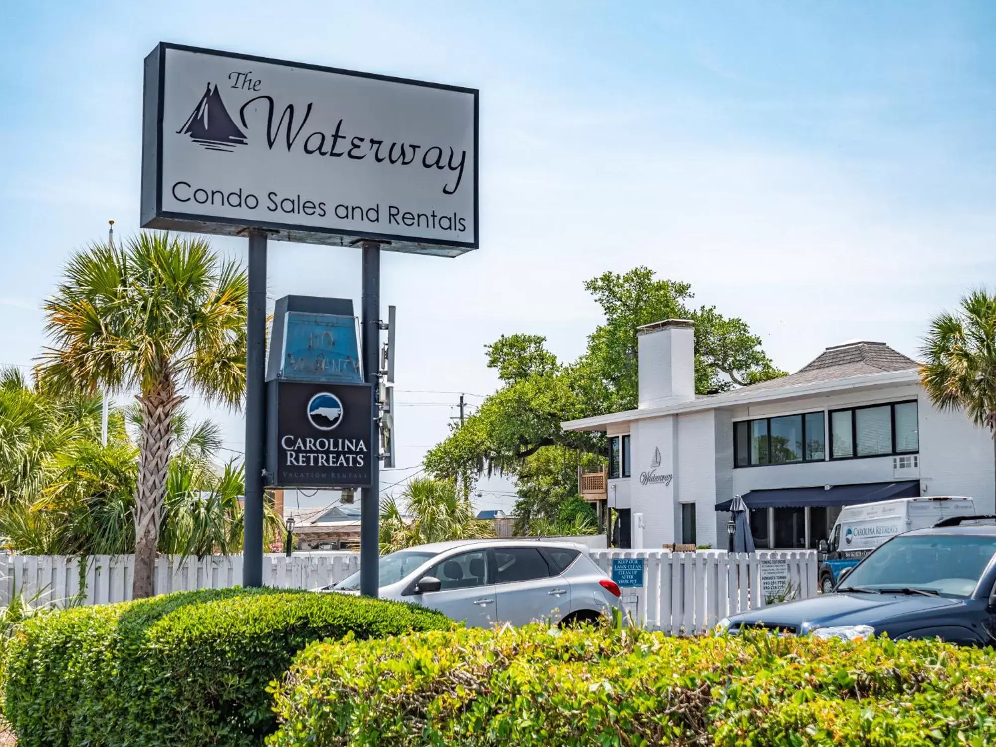 Property building, Property Logo/Sign in The Waterway Pet Friendly by Carolina Retreats