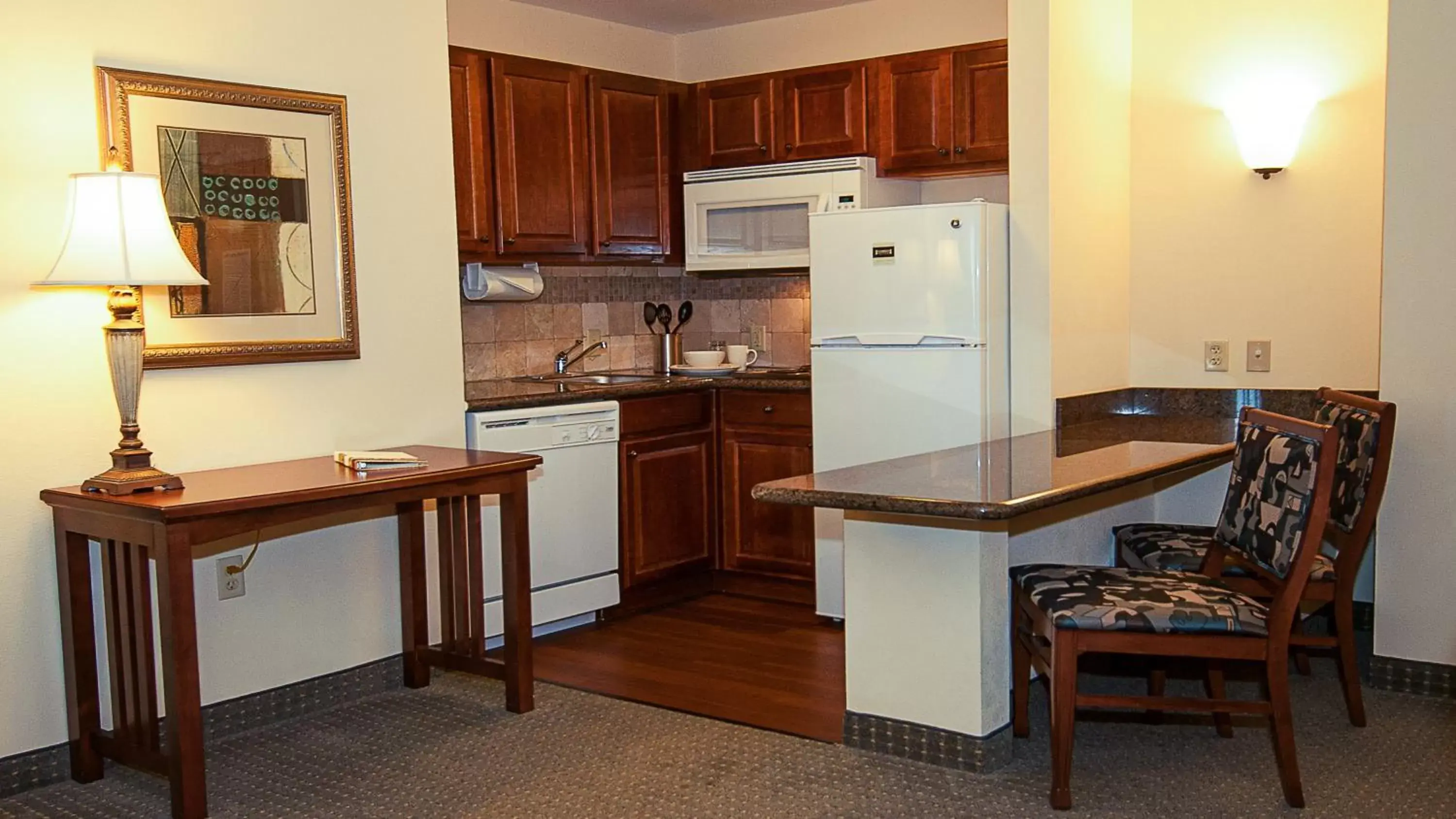 Photo of the whole room, Kitchen/Kitchenette in Staybridge Suites Wichita, an IHG Hotel