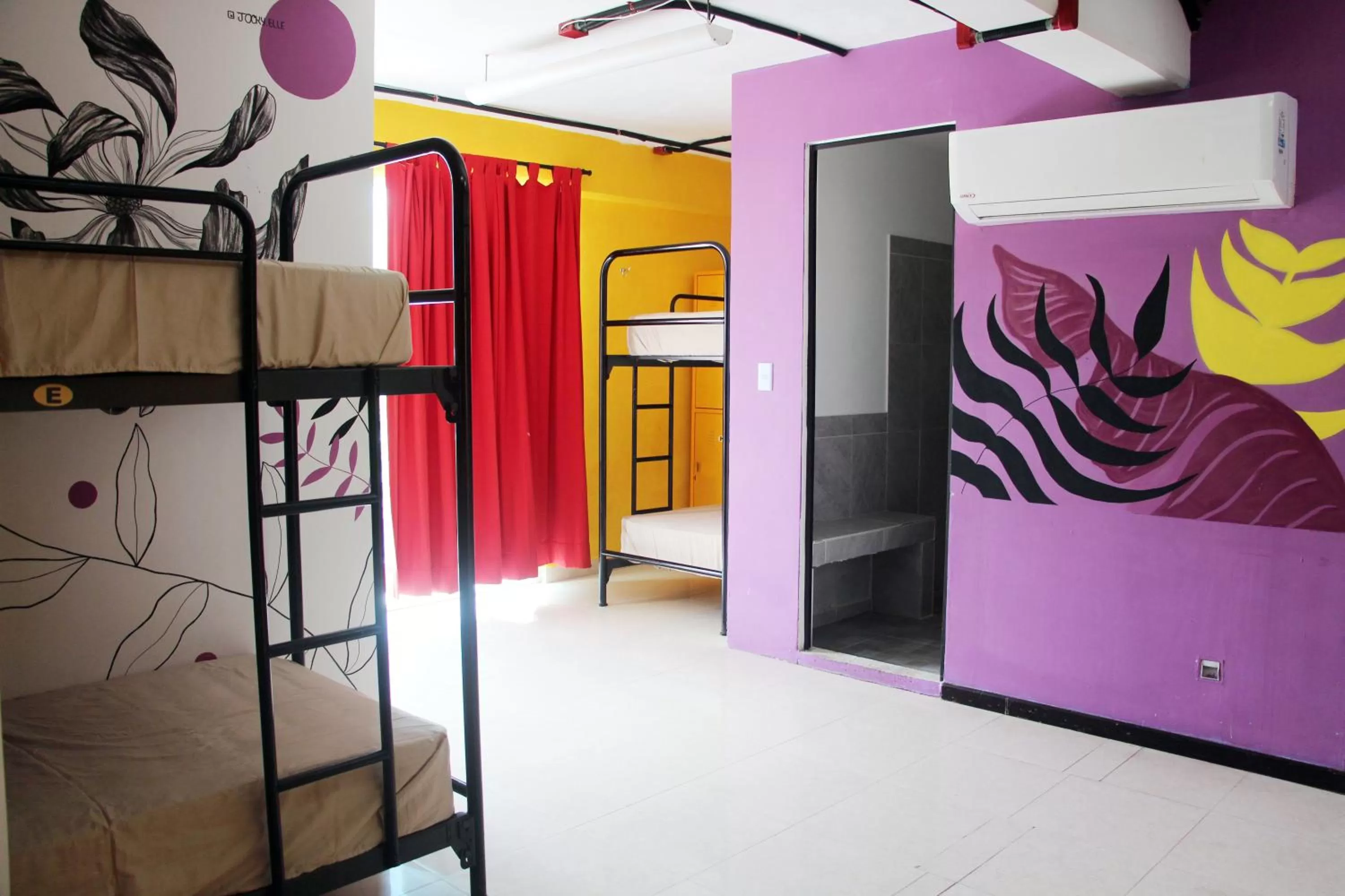 Photo of the whole room, Bunk Bed in Hotel & Hostal Casa de Luz Cancun