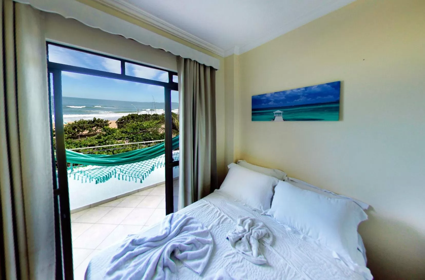 Bed in Pousada OceAnas Frente Mar Estaleiro