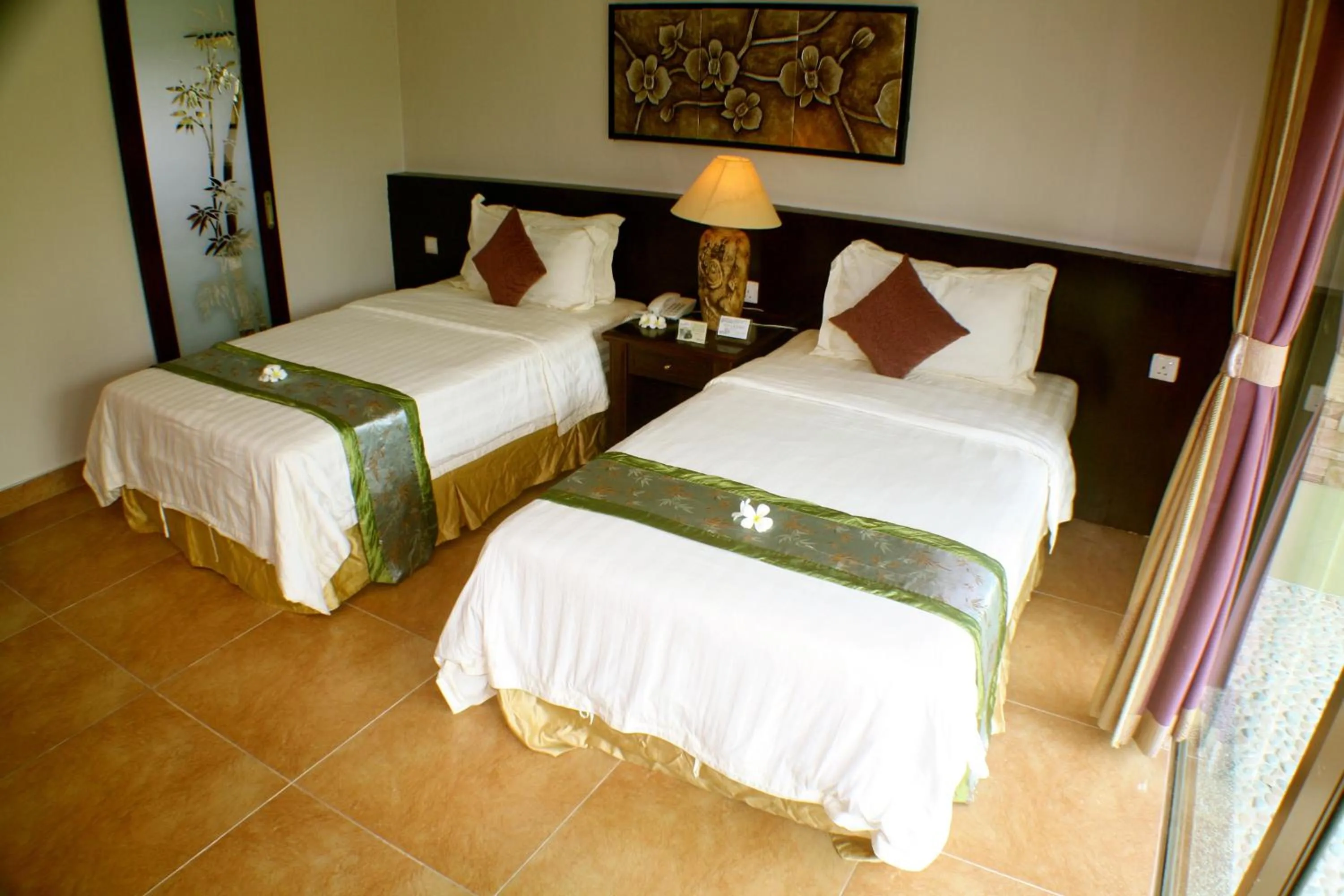 Bed in Beringgis Beach Resort & Spa