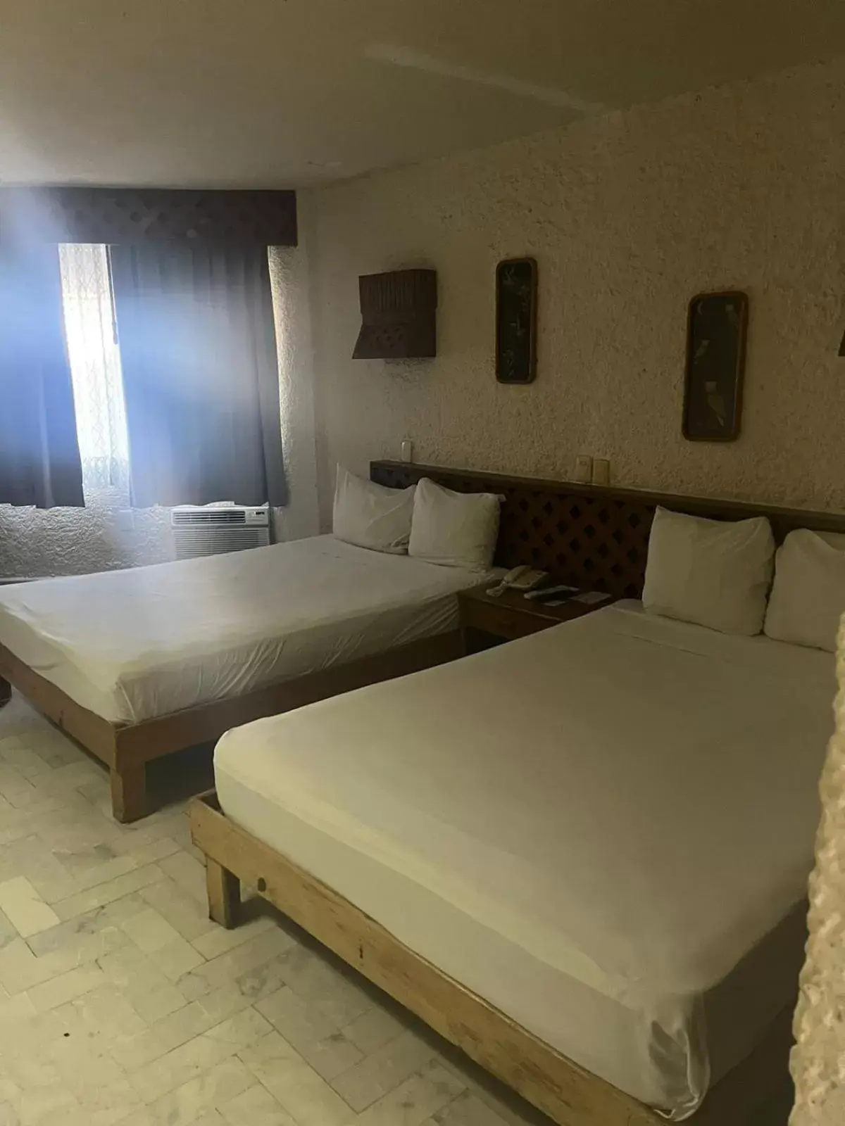 Bed in Hotel Plaza Kokai Cancún