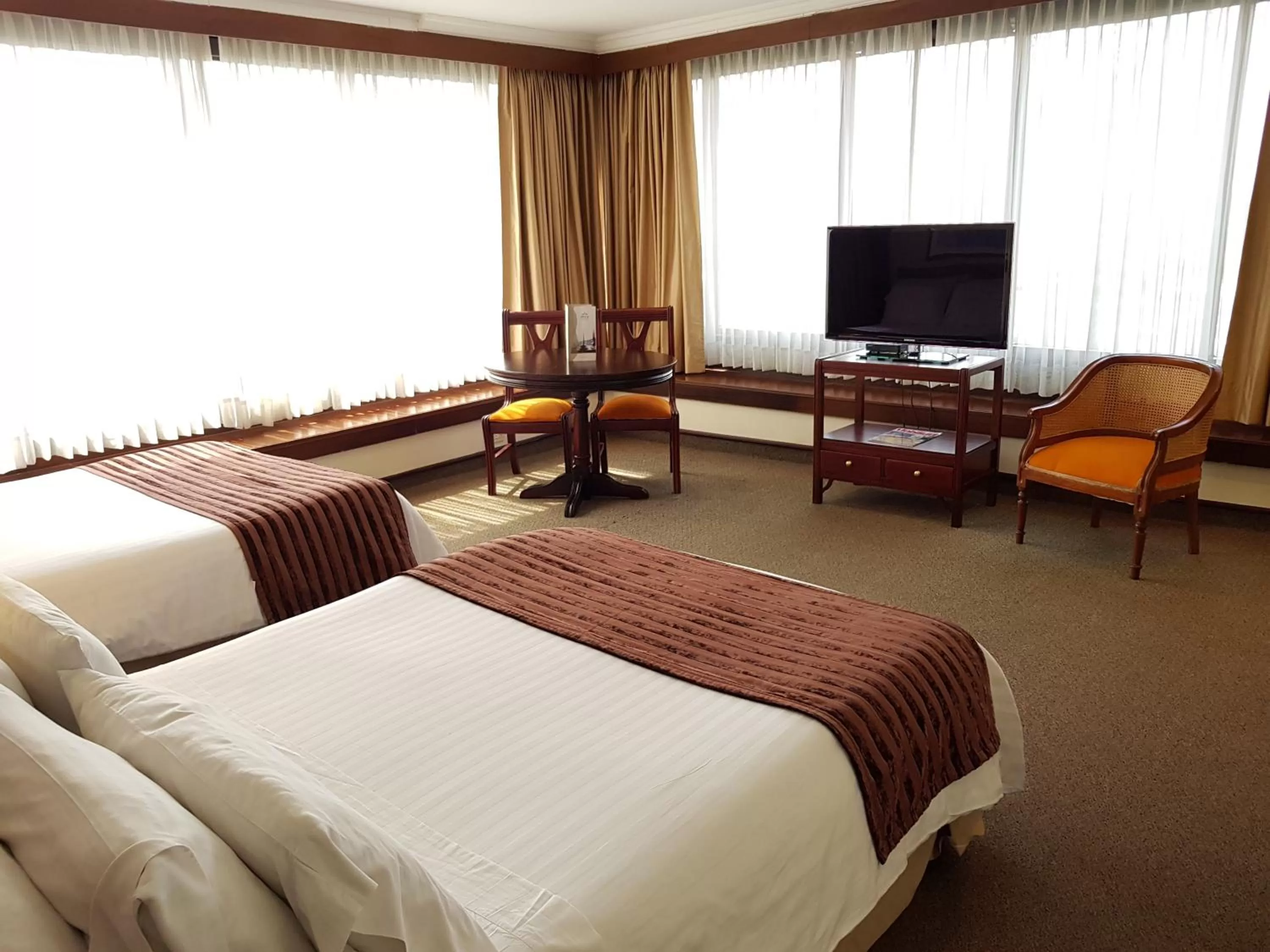 Bed in Torre de Cali Plaza Hotel