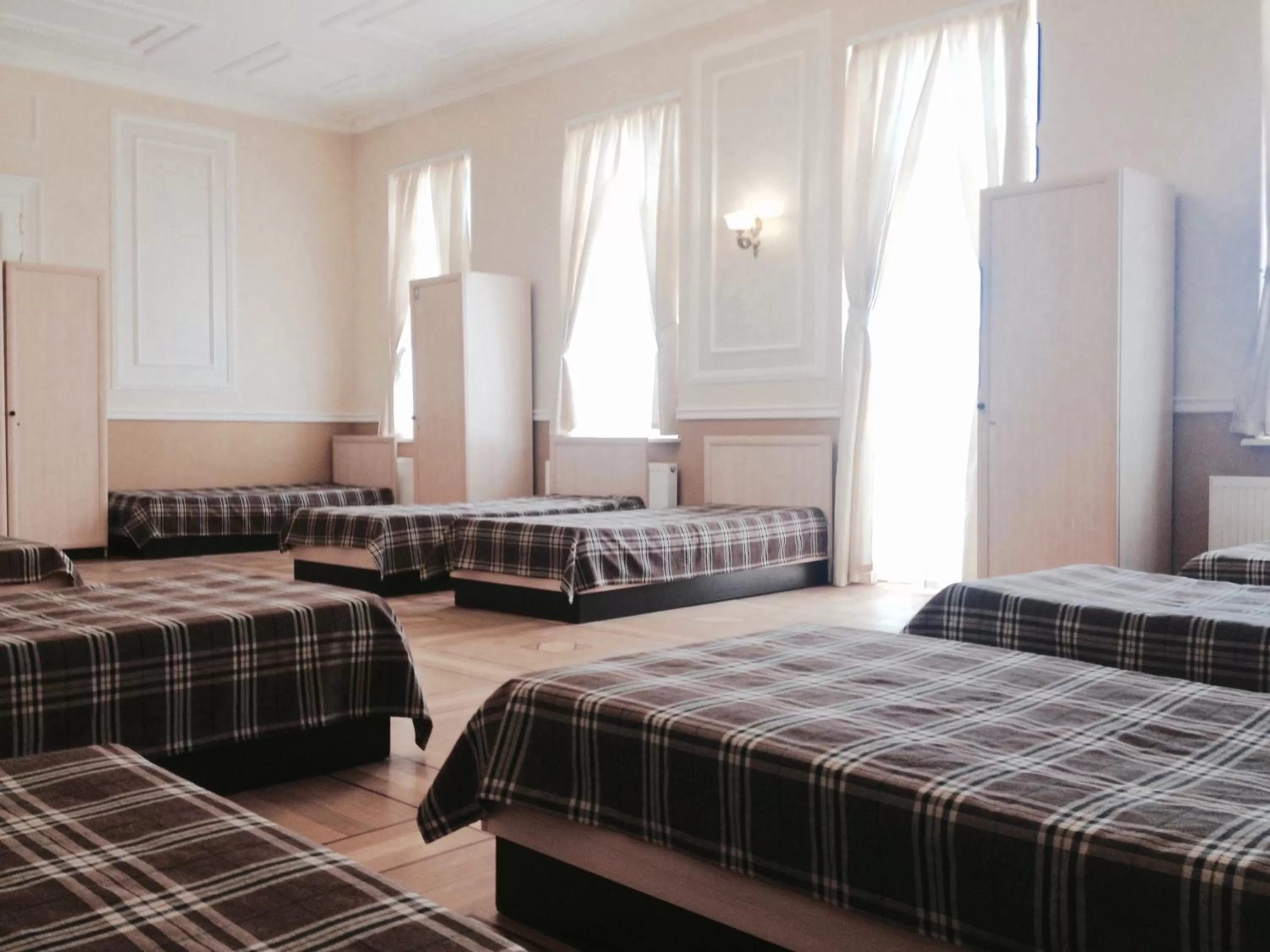 Family room with 10 single beds in Mini-Hotel Under The Roof