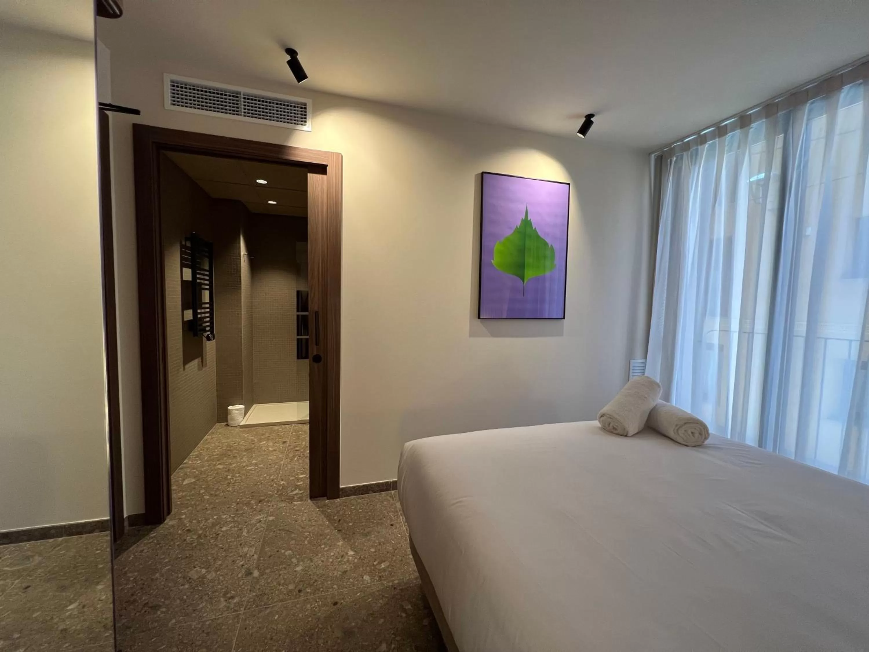 Bed in CIM HOTEL BOUTIQUE