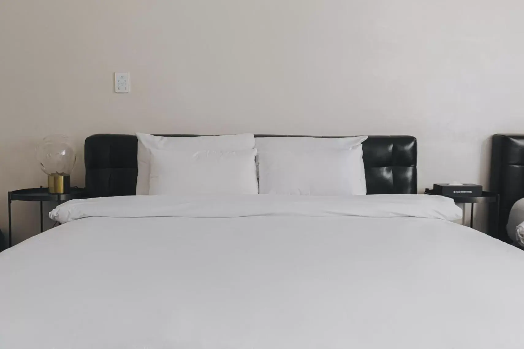 Bed in ACC Design Hotel