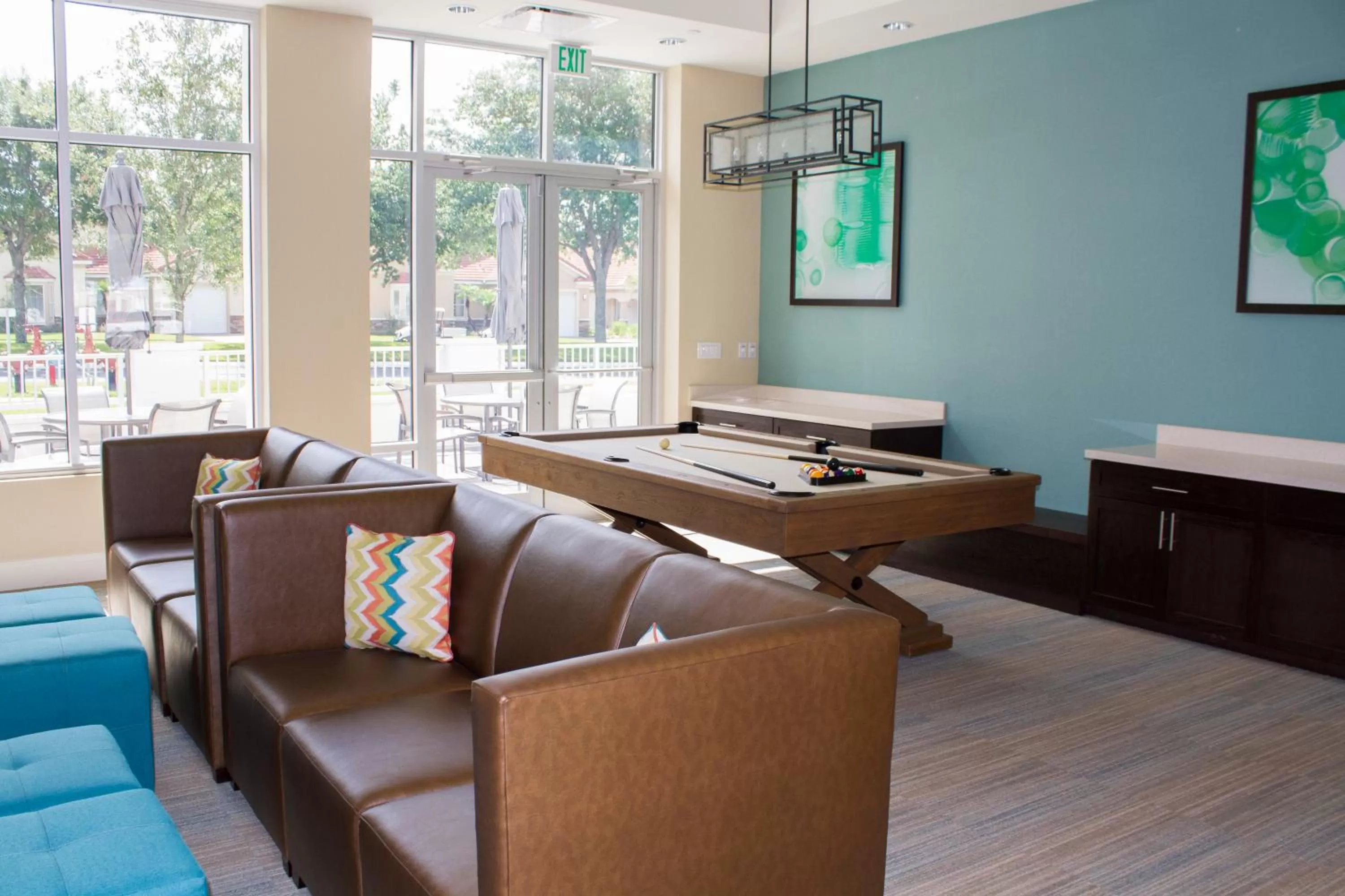 Communal lounge/ TV room in Summer Bay Orlando by Exploria Resorts