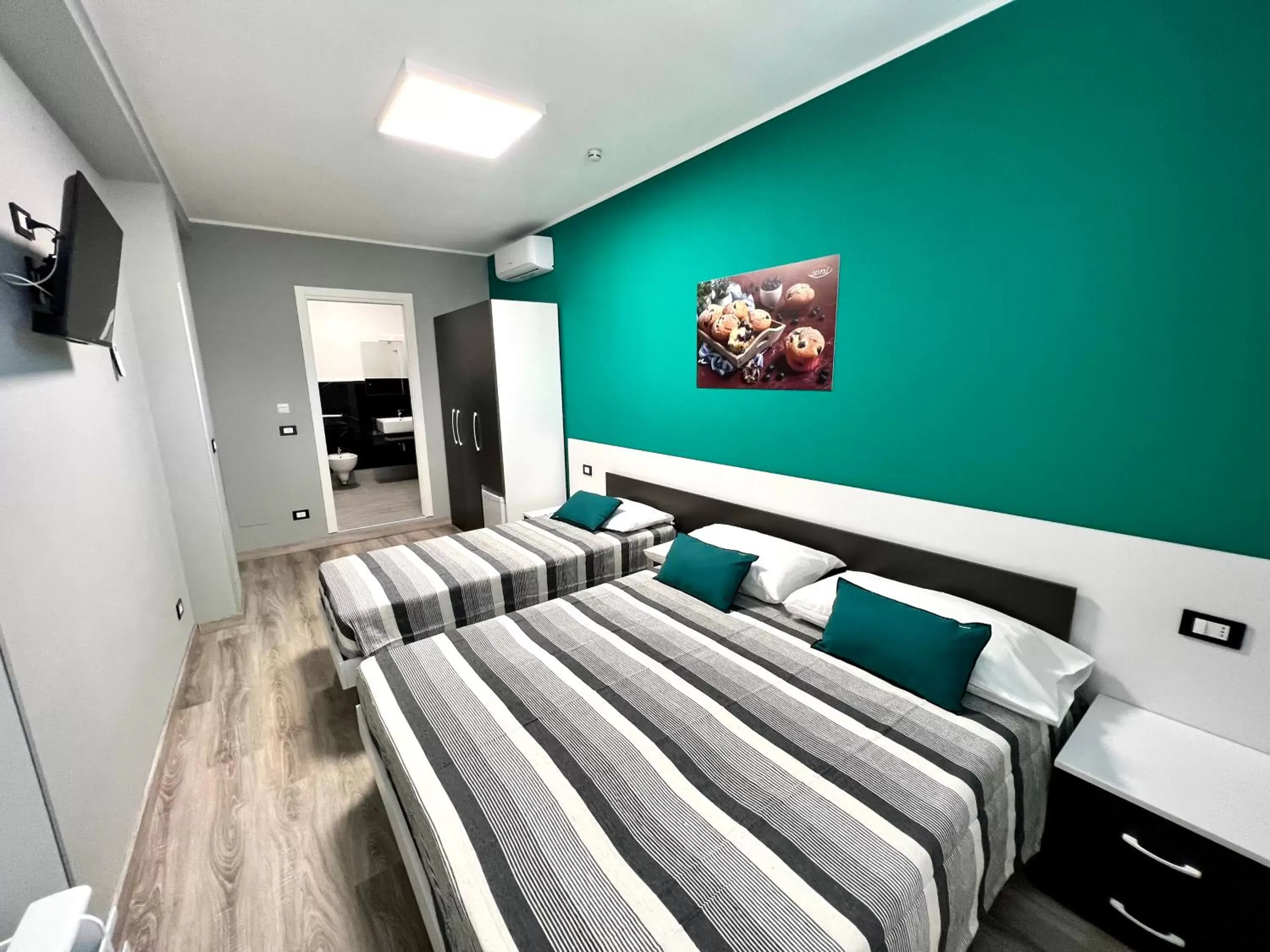 Bed in Siclari B&B-Rooms&Suite