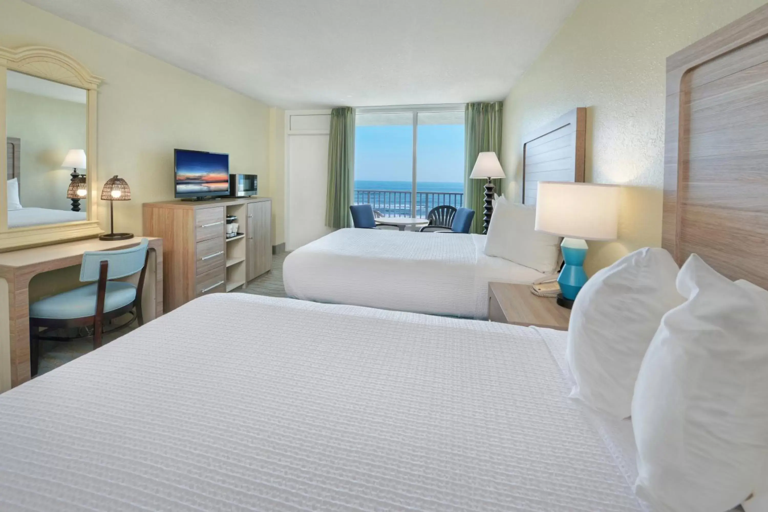 Bed in El Caribe Resort and Conference Center