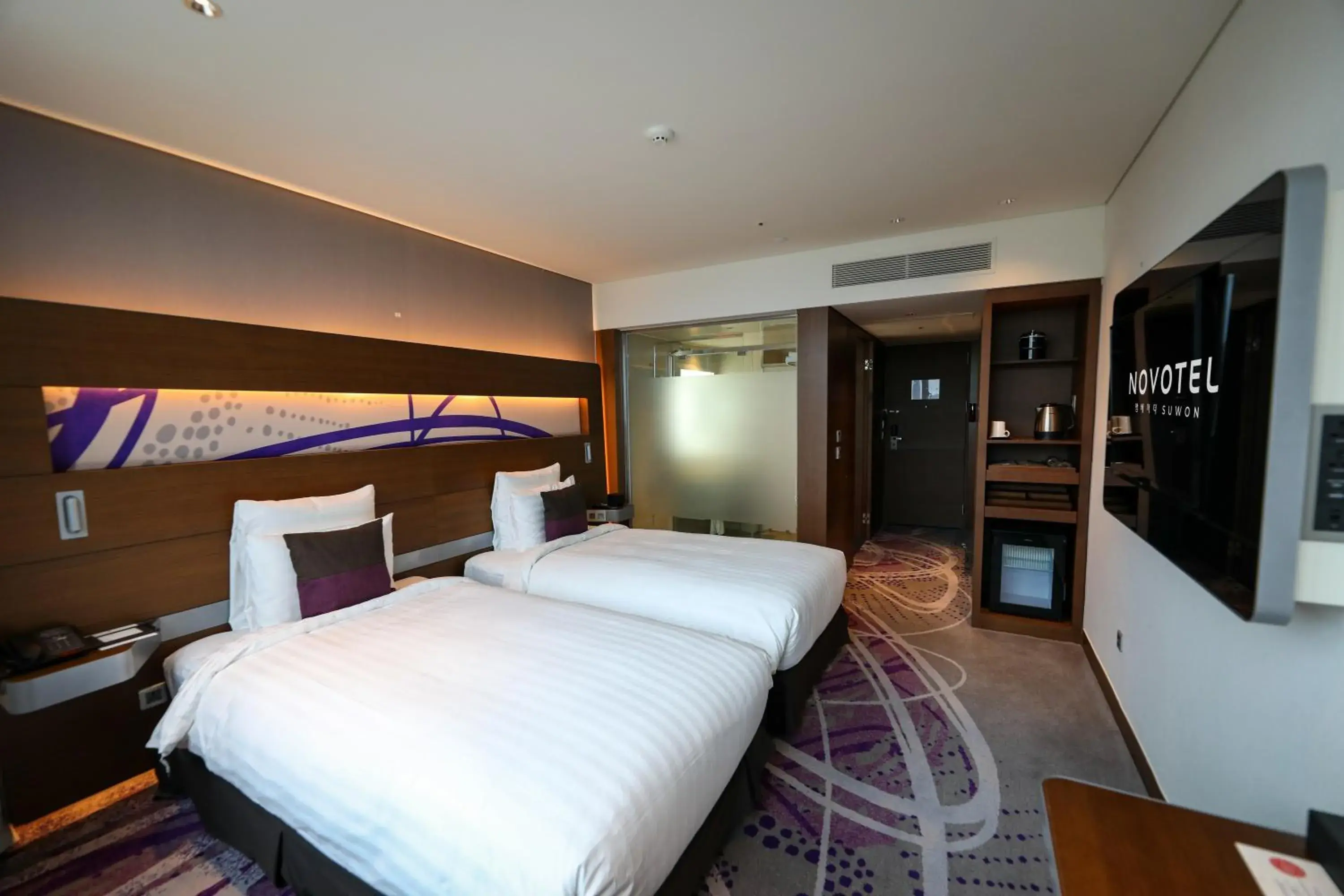 Bed in Novotel Ambassador Suwon Hotel
