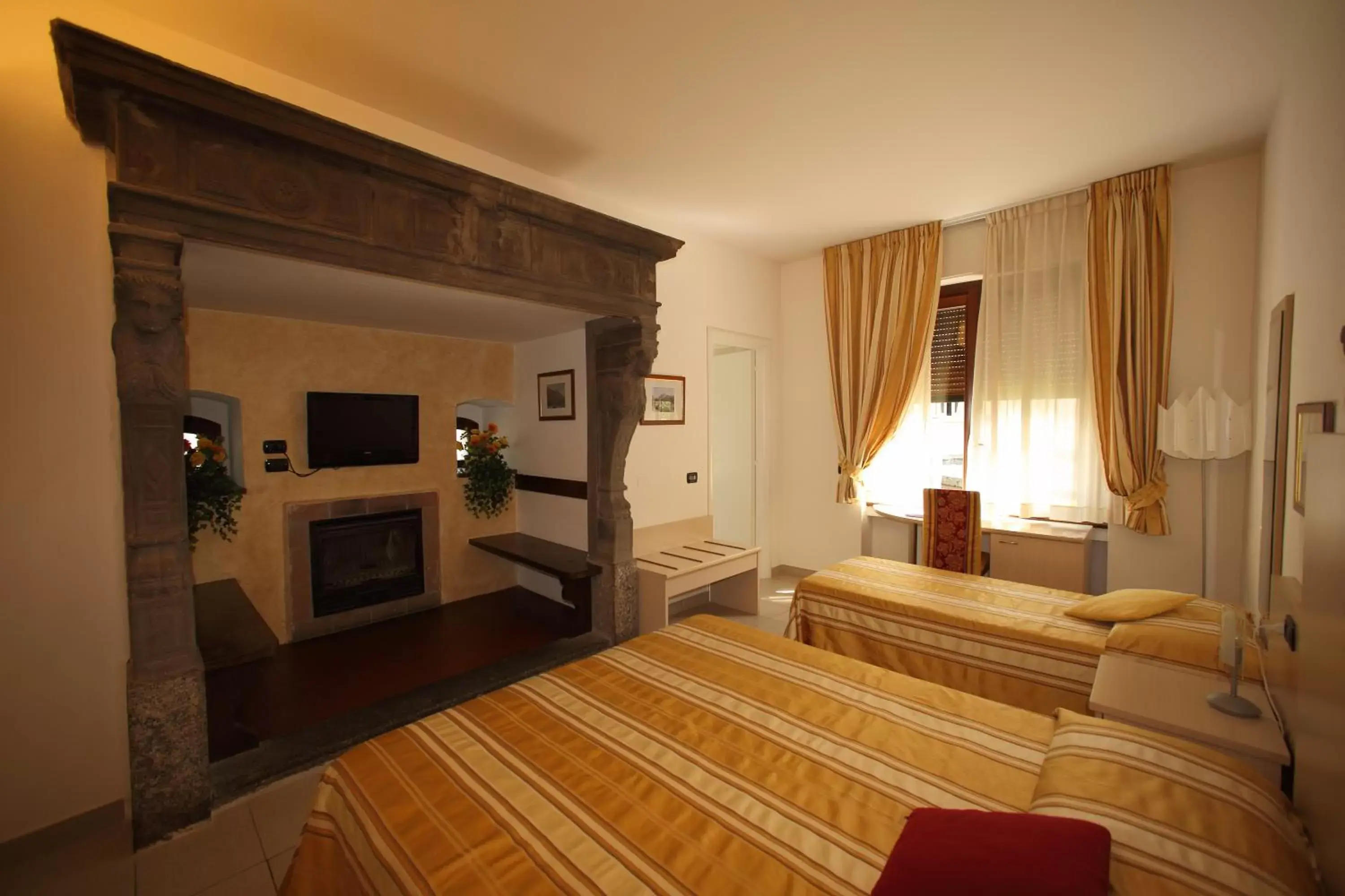 Photo of the whole room, Bed in Hotel Fioroni