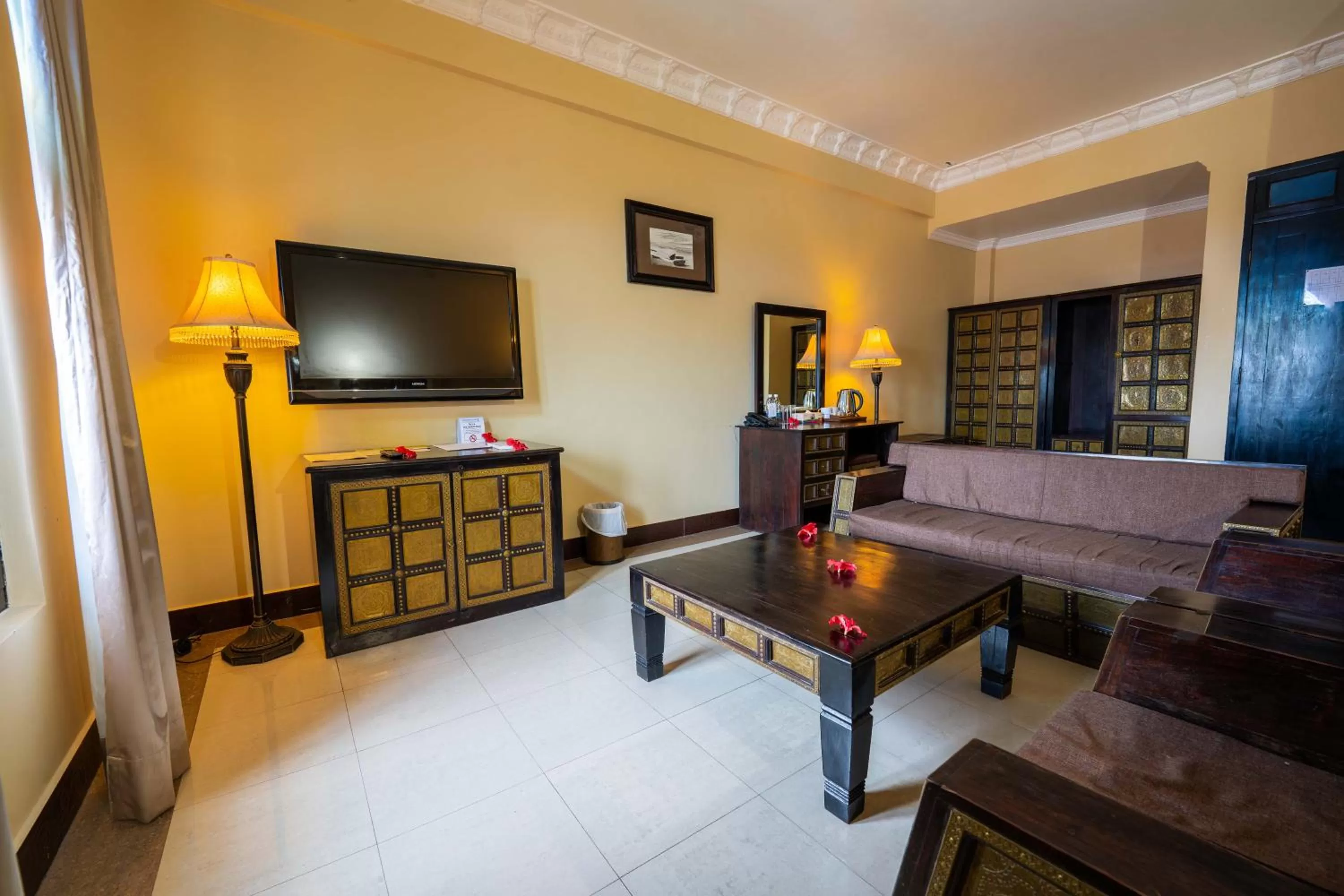 Living room in Golden Tulip Stone Town Boutique