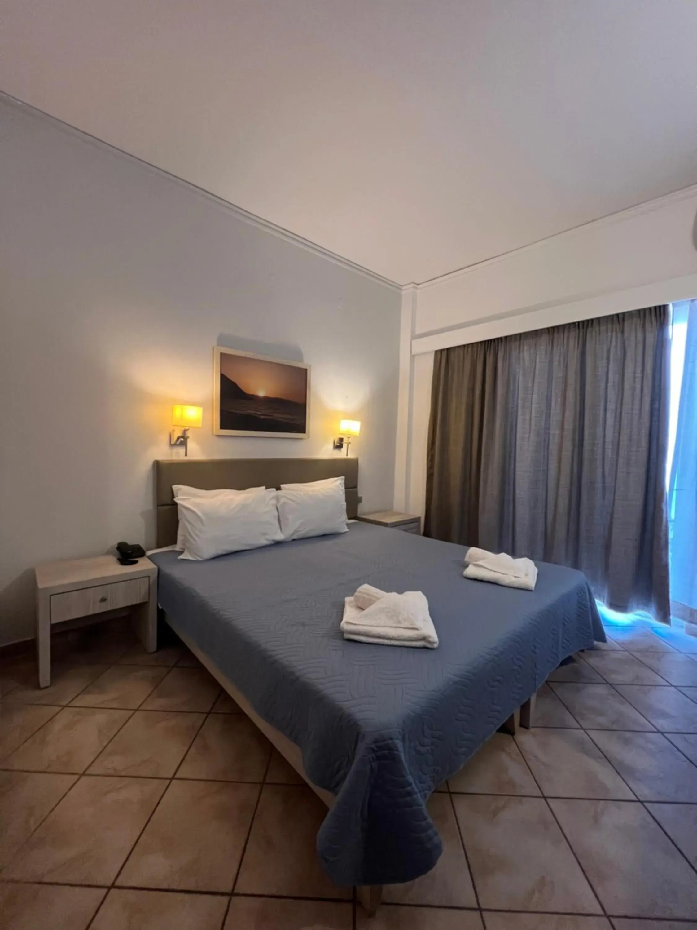 Bed in Aristea Hotel