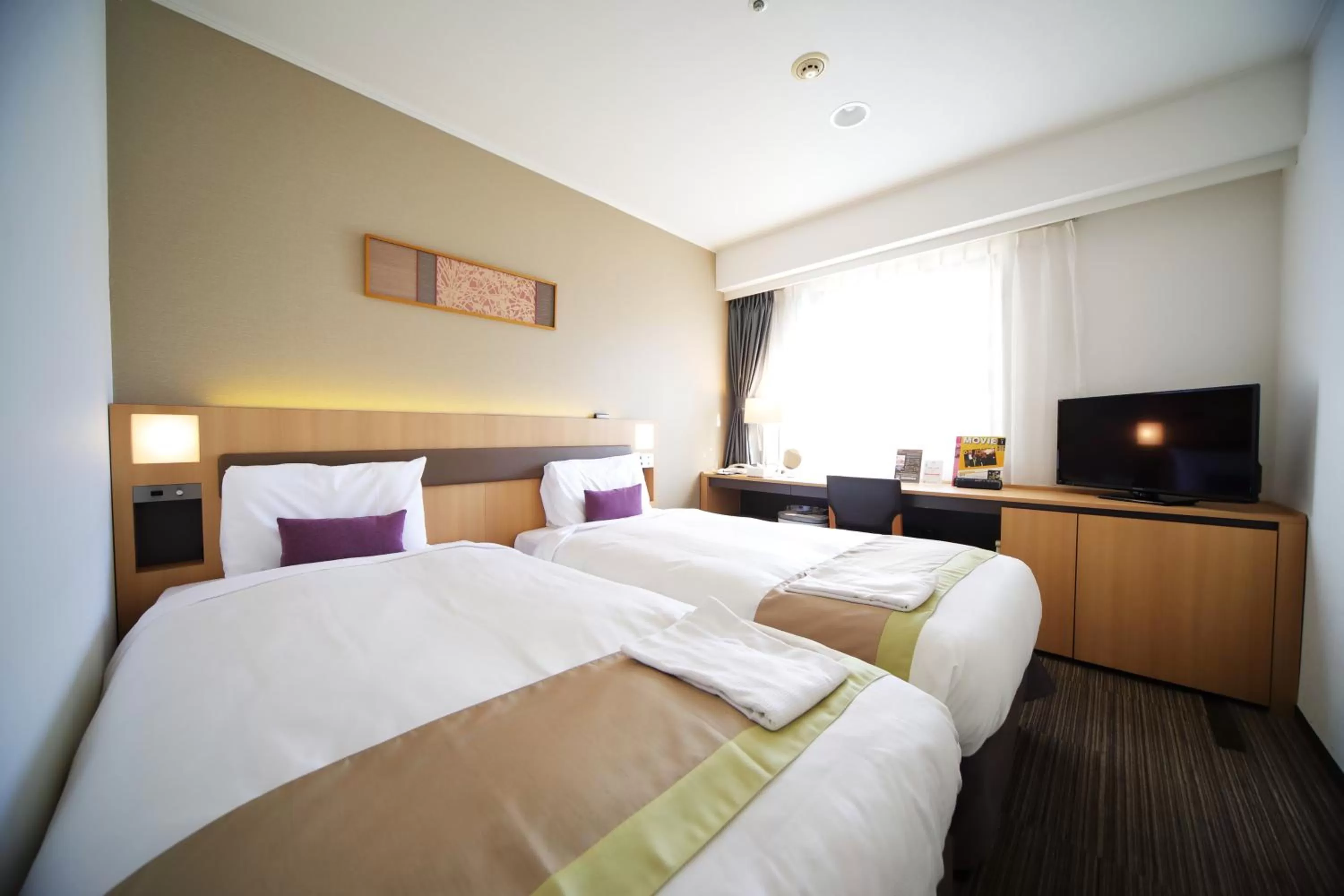 Bed in Hotel Sunroute Asakusa