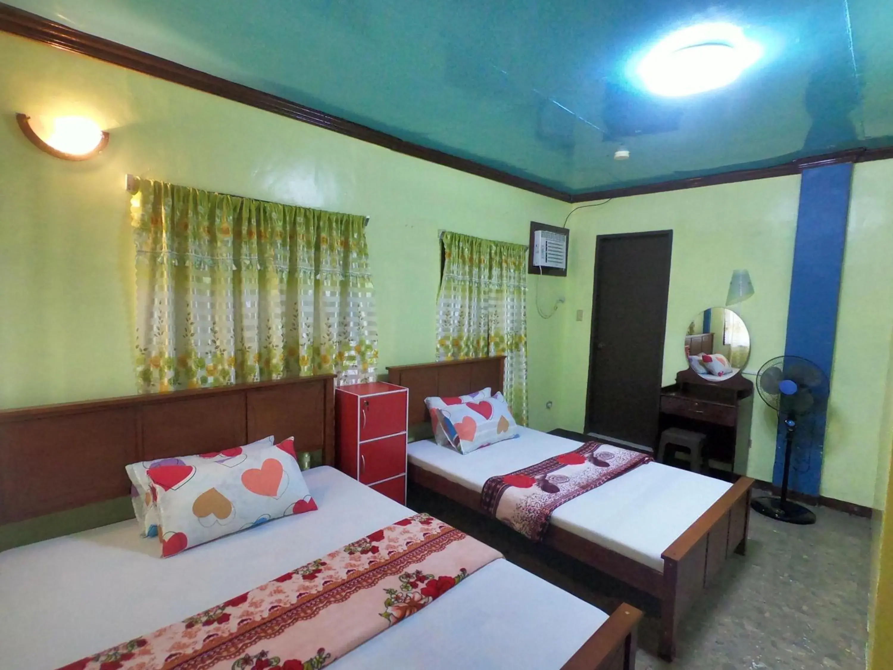 Bed in Bohol Sea Breeze Cottages and Resort