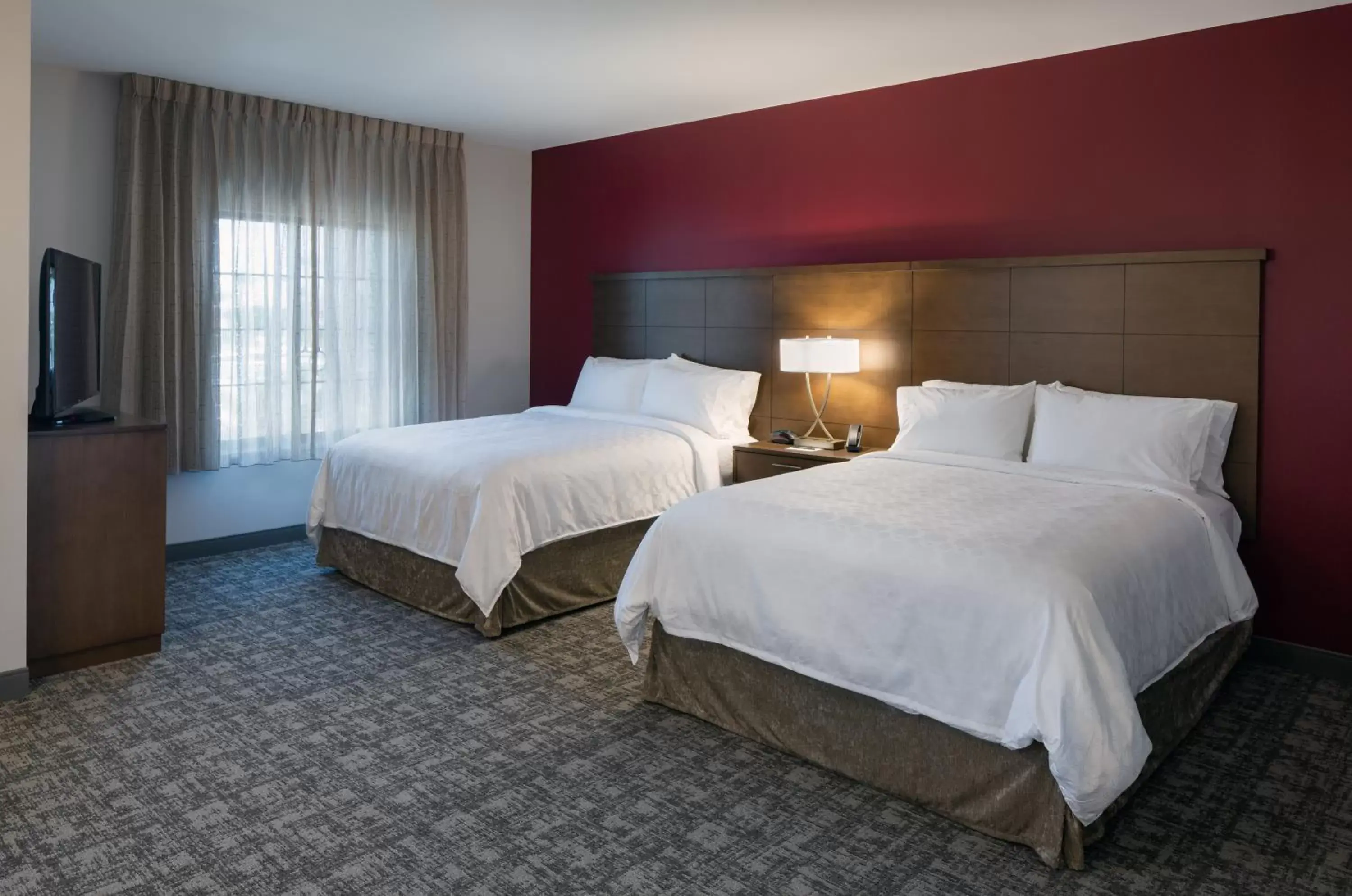 Bed in Staybridge Suites - Phoenix – Biltmore Area, an IHG Hotel