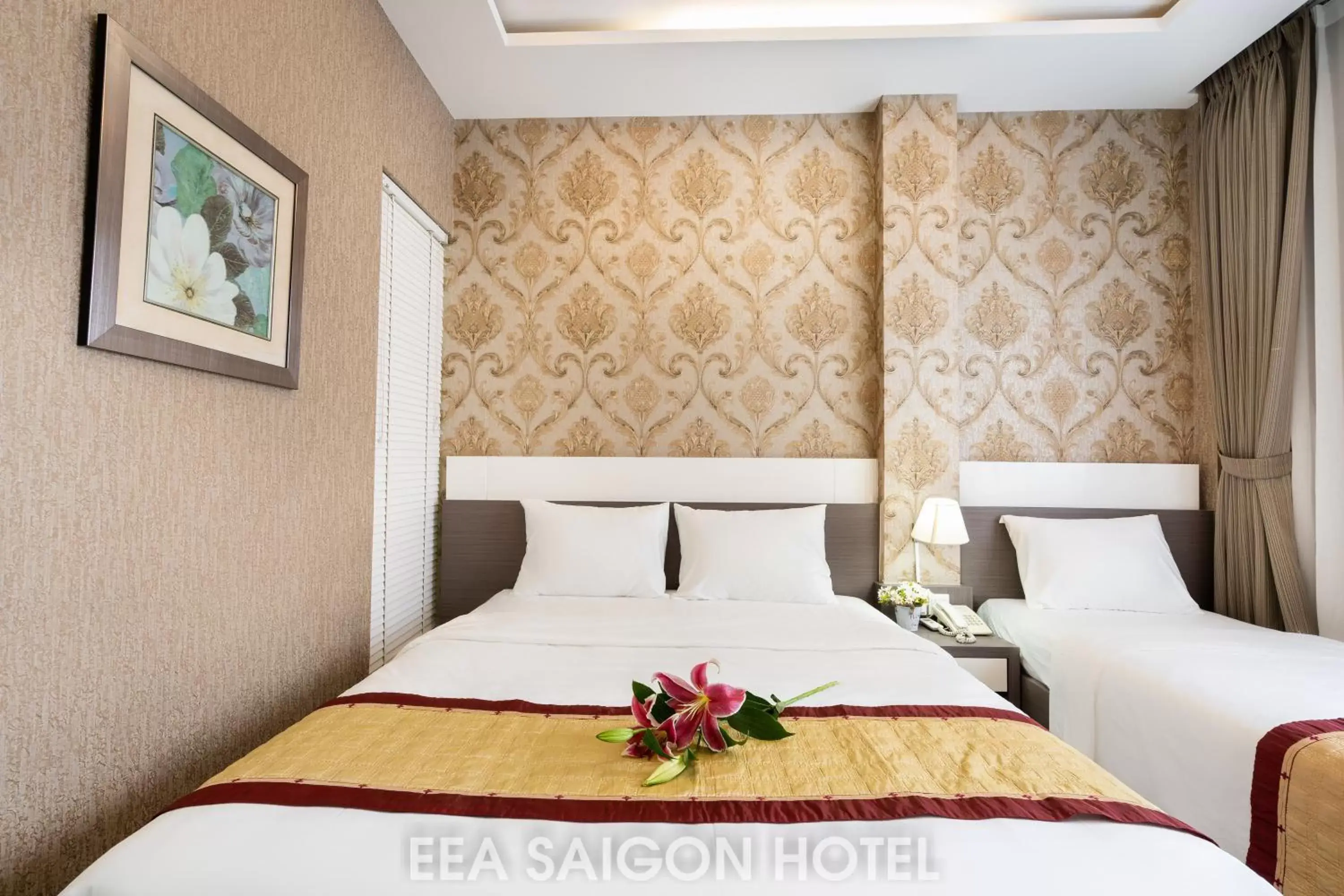 Bed in EEA Central Saigon Hotel